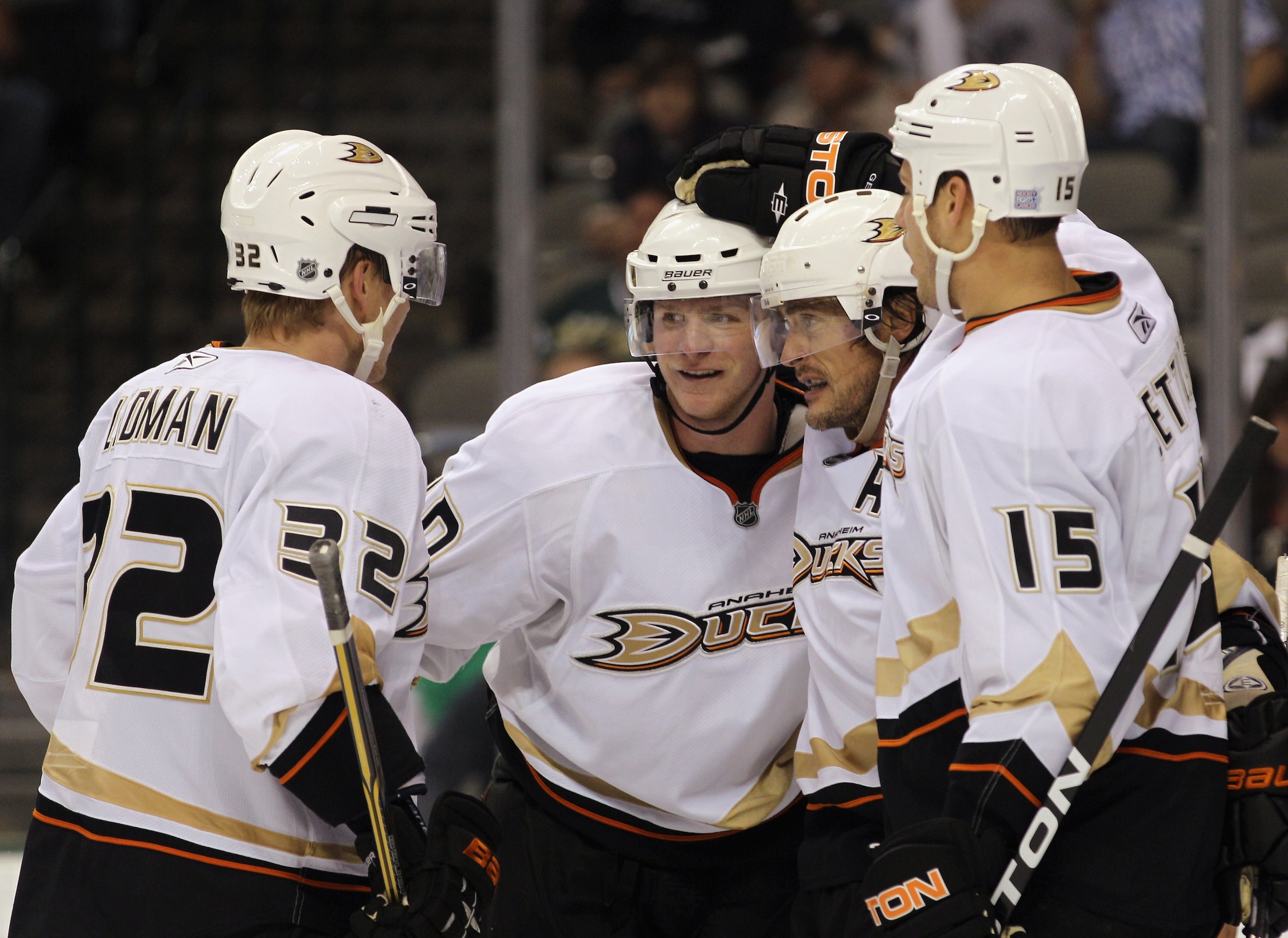 DALLAS - OCTOBER 26: (L-R) Toni Lydman #32, Corey Perry #10, Teemu Selanne #8 and Ryan Getzlaf #15 of the Anaheim Ducks celebrate Selanne's third period goal against the Dallas Stars at the American Airlines Center on October 26, 2010 in Dallas, Texas. Th
