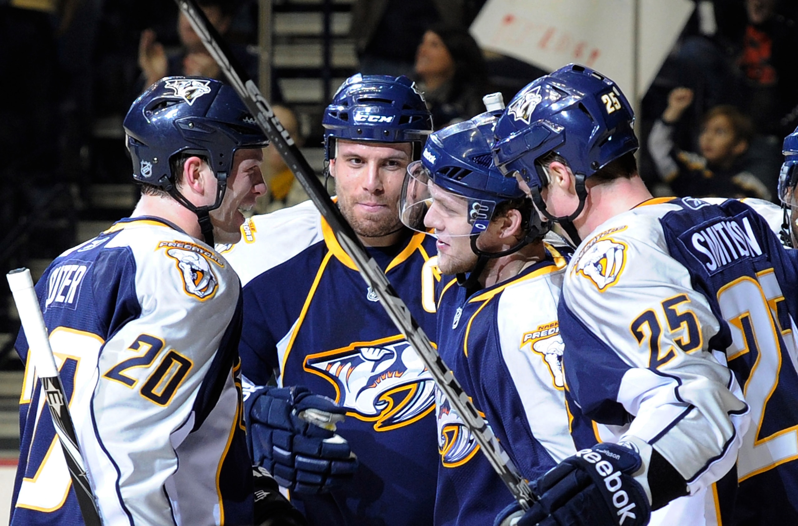 NASHVILLE, TN - JANUARY 02:  Ryan Suter #20, Shea Weber #6, and Jerred Smithson #25, congratulate teammate Nick Spaling #13 of the Nashville Predators on scoring a goal against the Columbus Blue Jackets on January 2, 2011 at the Bridgestone Arena in Nashv
