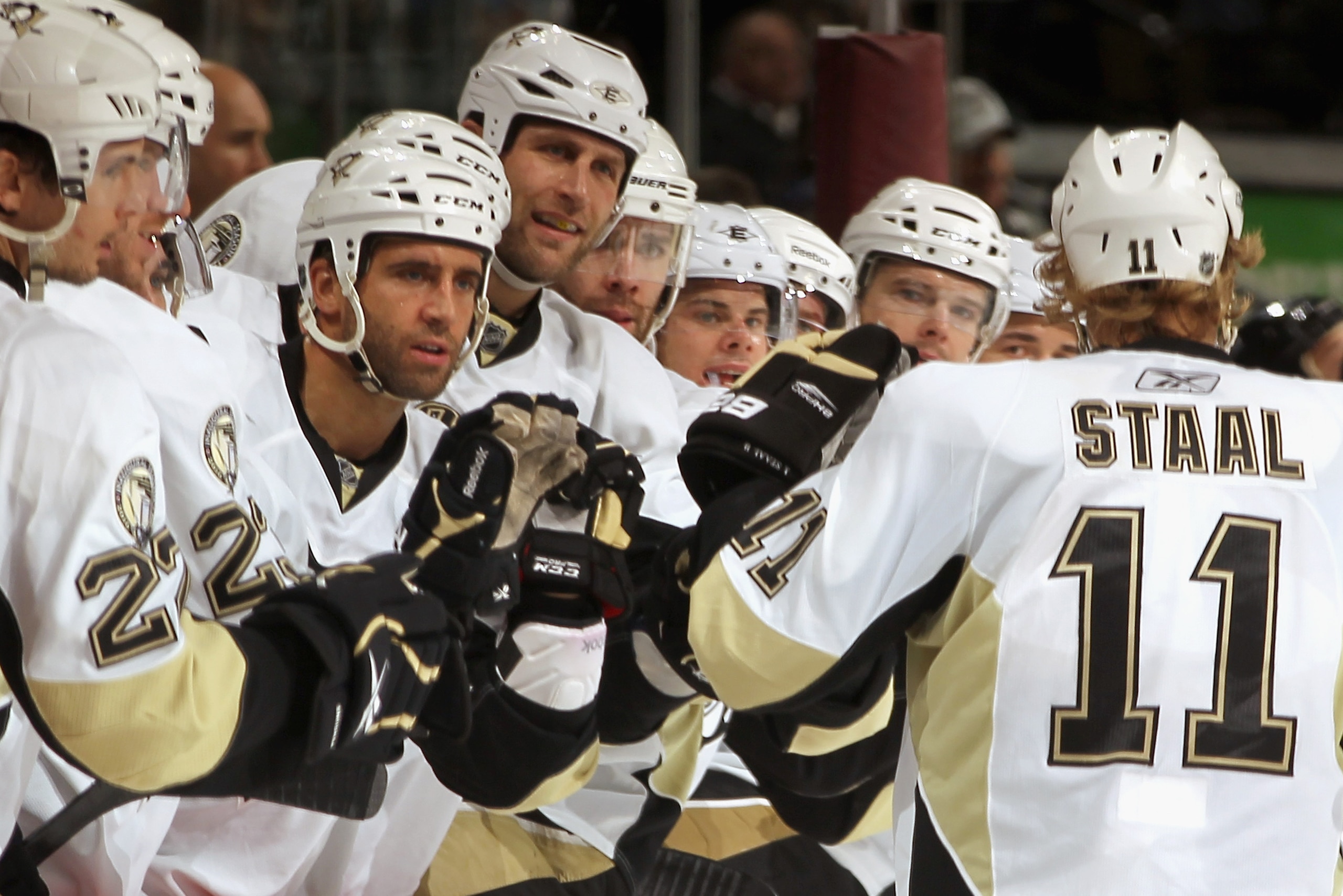 DENVER, CO - FEBRUARY 16:  Jordan Staal #11 of the Pittsburgh Penguins is congratulated by his teammates for his second period goal against the Colorado Avalanche at the Pepsi Center on February 16, 2011 in Denver, Colorado.  (Photo by Doug Pensinger/Gett