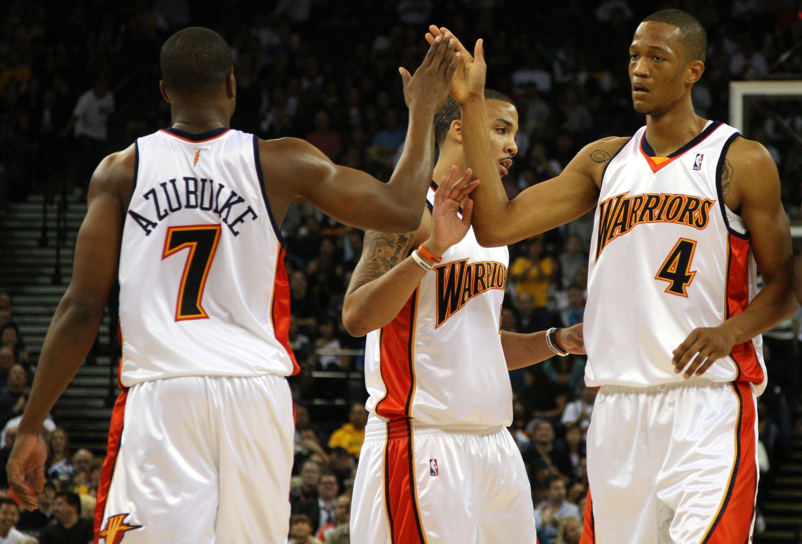 OAKLAND, CA - NOVEMBER 07: Kelenna Azubuike #7, Marcus Williams #5 and Anthony Randolph #4 of the Golden State Warriors celebrate against the Memphis Grizzlies during an NBA game on November 7, 2008 at Oracle Arena in Oakland, California. NOTE TO USER: U OAKLAND, CA - NOVEMBER 07: Kelenna Azubuike #7, Marcus Williams #5 and Anthony Randolph #4 of the Golden State Warriors celebrate against the Memphis Grizzlies during an NBA game on November 7, 2008 at Oracle Arena in Oakland, California. NOTE TO USER: U