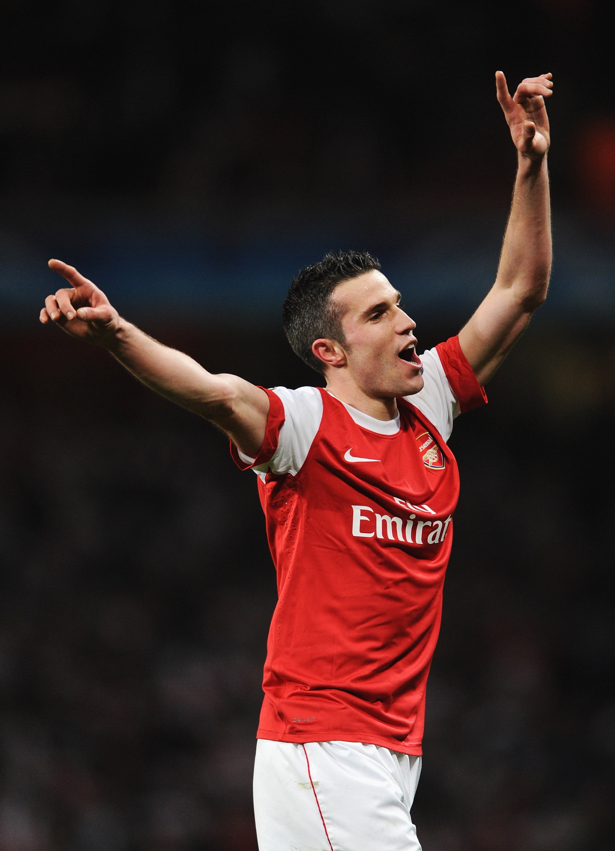 LONDON, ENGLAND - FEBRUARY 16: Robin van Persie of Arsenal celebrates victory after the UEFA Champions League round of 16 first leg match between Arsenal and Barcelona at the Emirates Stadium on February 16, 2011 in London, England. (Photo by Jasper Jui LONDON, ENGLAND - FEBRUARY 16: Robin van Persie of Arsenal celebrates victory after the UEFA Champions League round of 16 first leg match between Arsenal and Barcelona at the Emirates Stadium on February 16, 2011 in London, England. (Photo by Jasper Jui