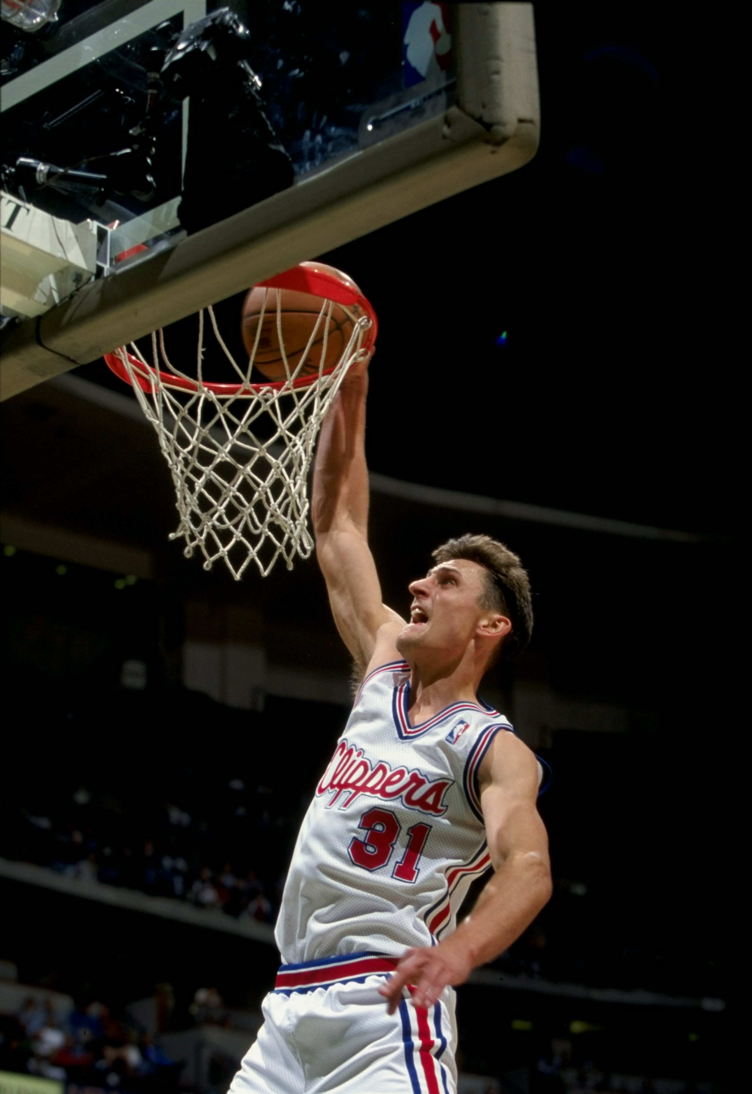 28 Nov 1997:  Guard Brent Barry of the Los Angeles Clippers in action against the New Jersey Nets during a game at Arrowhead Pond in Anaheim, California.  The Nets defeated the Clippers 104-92. Mandatory Credit: Todd Warshaw  /Allsport