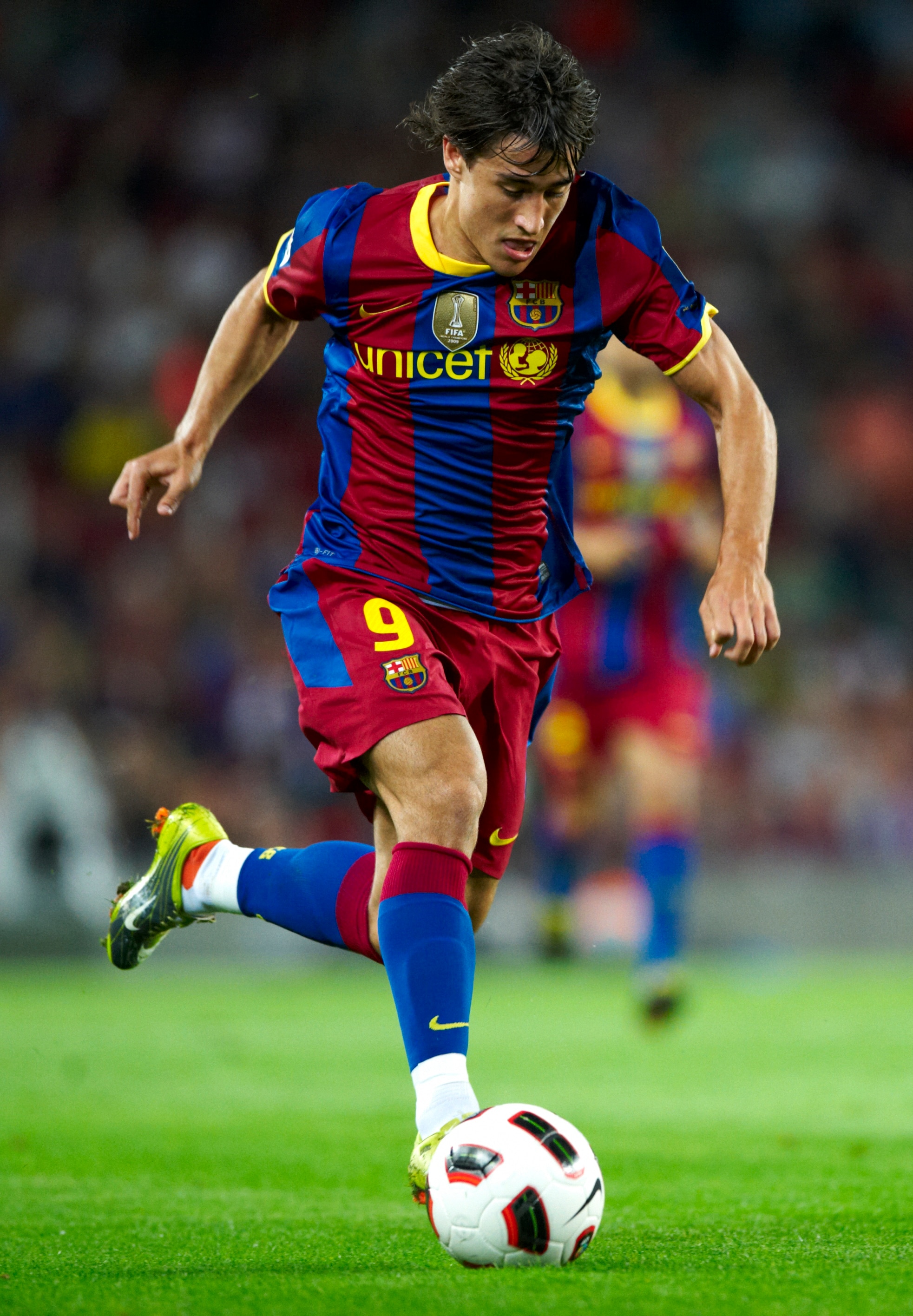 BARCELONA, SPAIN - SEPTEMBER 22:  Bojan Krkic of FC Barcelona runs with the ball during the La Liga match between Barcelona and Sporting de Gijon at Nou Camp on September 22, 2010 in Barcelona, Spain. Barcelona won 1-0.  (Photo by Manuel Queimadelos Alons