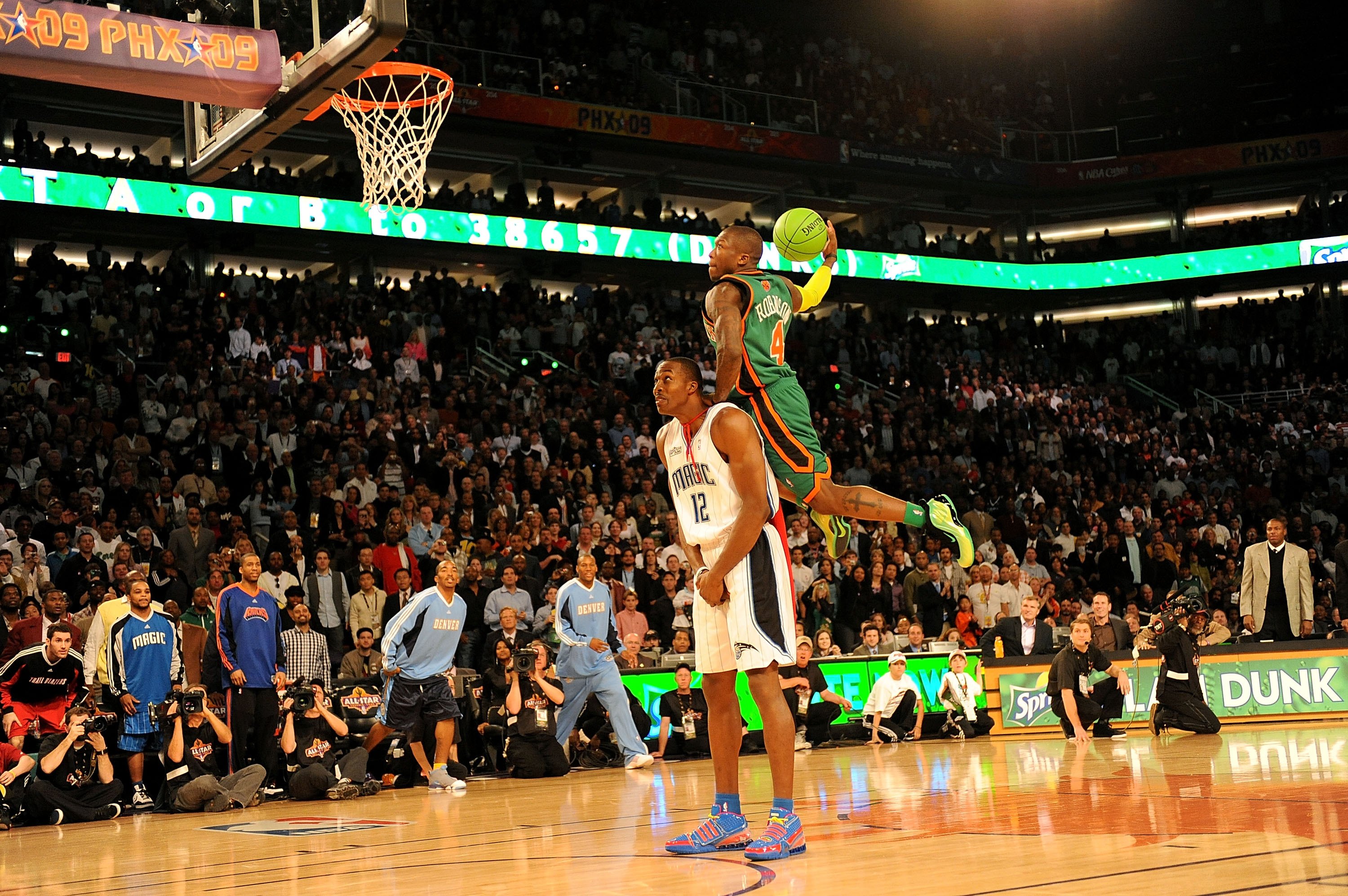 Gerald Green, from the Boston Celtics, jumps over a table to win the slam  dunk contest during NBA All-Star weekend in Las Vegas on Saturday, Feb. 17,  2007. (AP Photo/ Kevork Djansezian