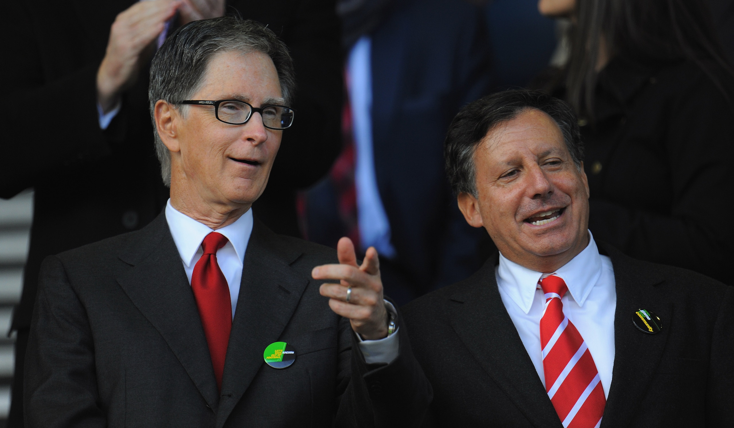 LIVERPOOL, ENGLAND - OCTOBER 17: New Liverpool co-owners John W Henry (L) and NESV Chairman Tom Werner look on during the Barclays Premier League match between Everton and Liverpool at Goodison Park on October 17, 2010 in Liverpool, England.  (Photo by Mi