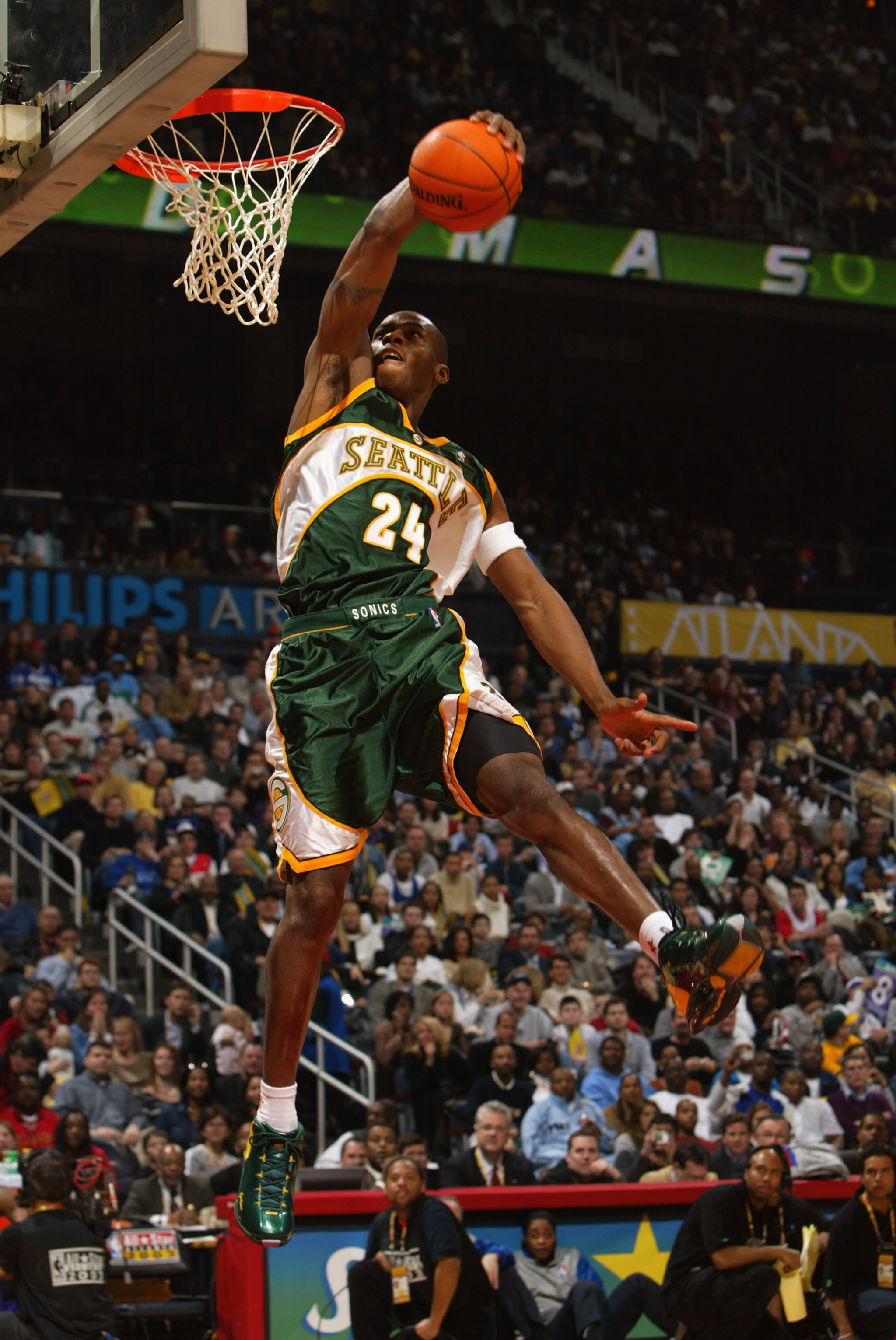 ATLANTA - FEBRUARY 8:   Desmond Mason #24 of the Seattle Sonics makes a dunk to go on to win second place at the Sprite Rising Stars Slam Dunk Contest during the 2003 NBA All-Star Weekend at Philips Arena on February 8, 2003 in Atlanta, Georgia.  NOTE TO 