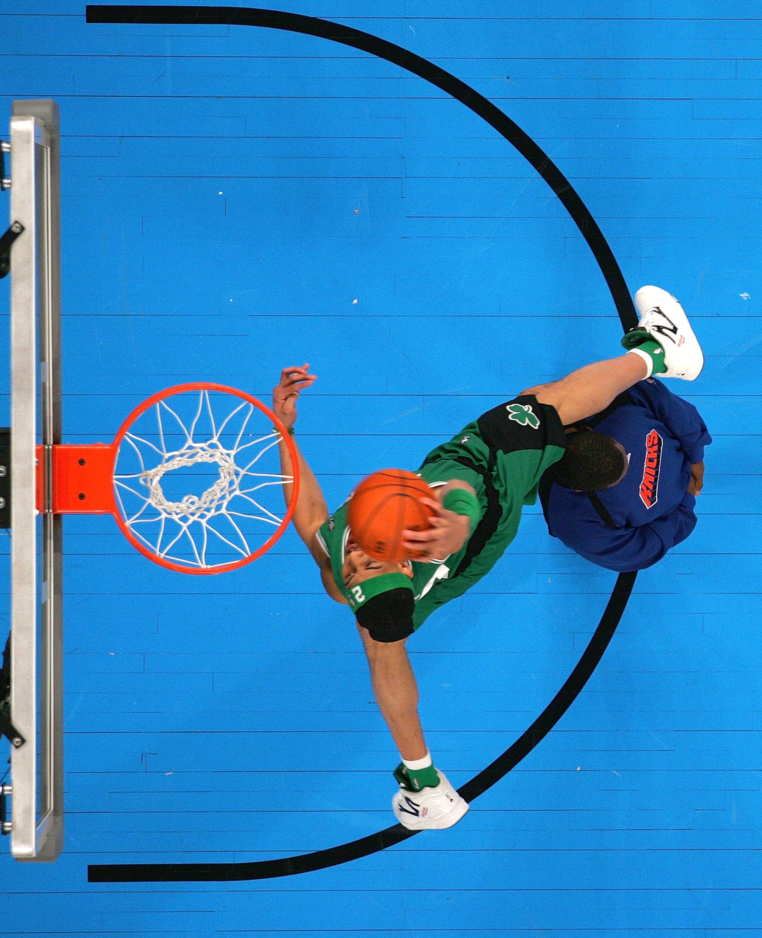 LAS VEGAS - FEBRUARY 17:  Gerald Green of the Boston Celtics leaps over fellow competitor Nate Robinson of the New York Knicks in the Sprite Slam Dunk Competition during NBA All-Star Weekend on February 17, 2007 at Thomas & Mack Center in Las Vegas, Nevad