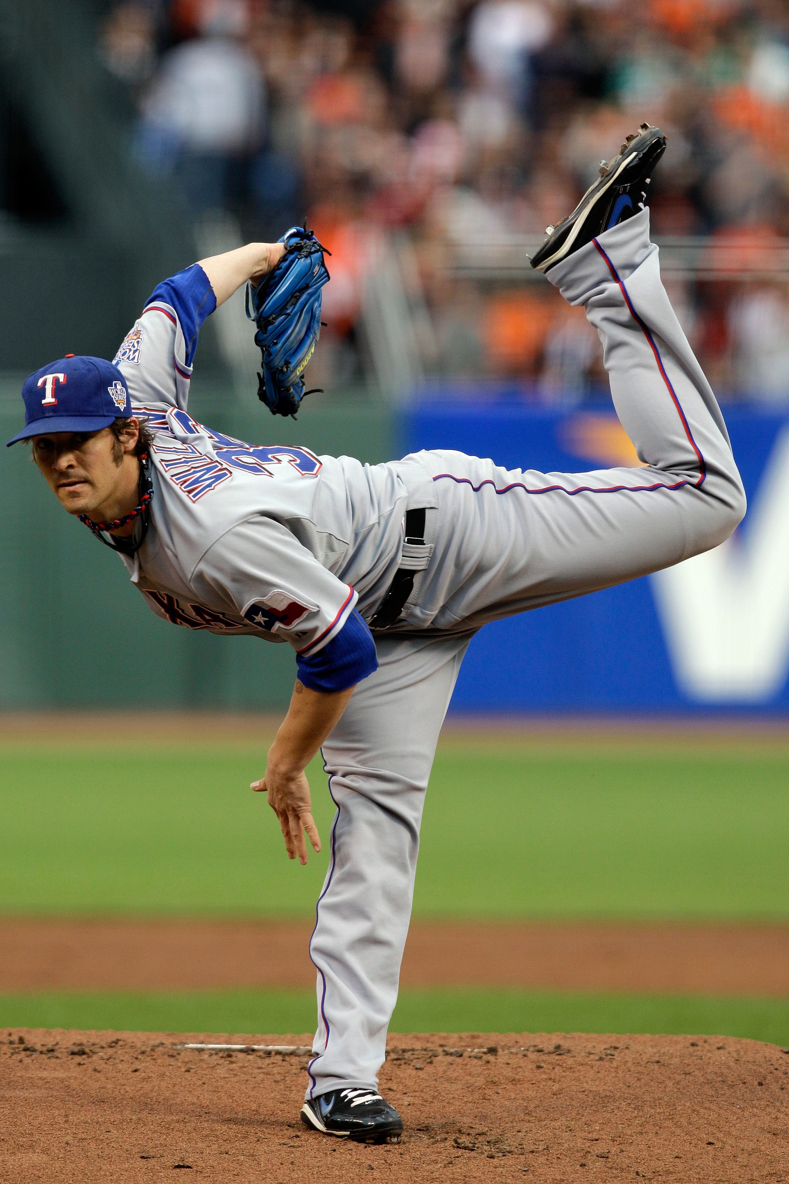 SAN FRANCISCO - OCTOBER 28:  Starting pitcher C.J. Wilson #36 of the Texas Rangers pitches in the first inning against the San Francisco Giants in Game Two of the 2010 MLB World Series at AT&T Park on October 28, 2010 in San Francisco, California.  (Photo