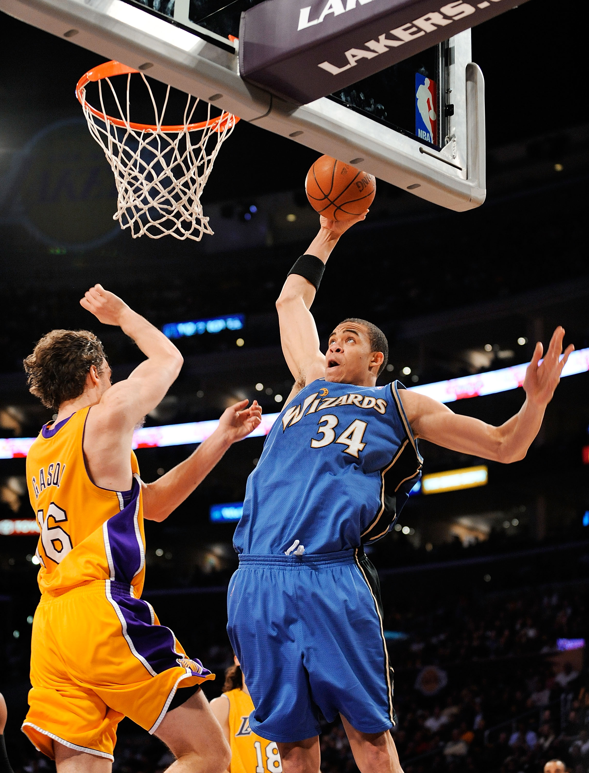 LOS ANGELES, CA - JANUARY 22: JaVale McGee #34 of the Washington Wizards slams the ball against Pau Gasol of the Los Angeles Lakers during the second quarter at the Staples Center January 22, 2009 in Los Angeles, California. NOTE TO USER: User expressly a