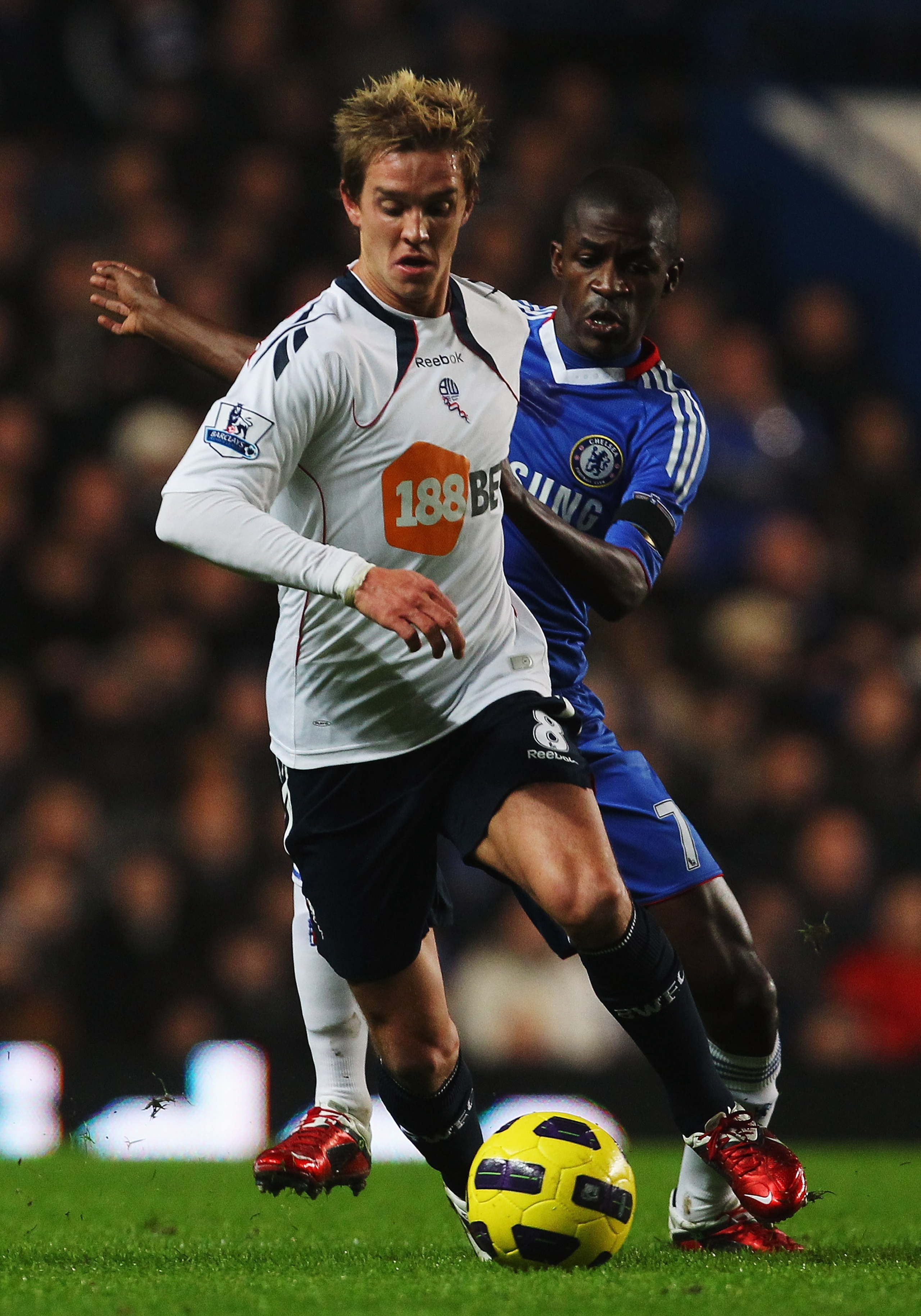 LONDON, UNITED KINGDOM - DECEMBER 29:  Stuart Holden (L) of Bolton Wanderers holds off the challenge of Ramires (R) of Chelsea during the Barclays Premier League match between Chelsea and Bolton Wanderers at Stamford Bridge on December 29, 2010 in London,