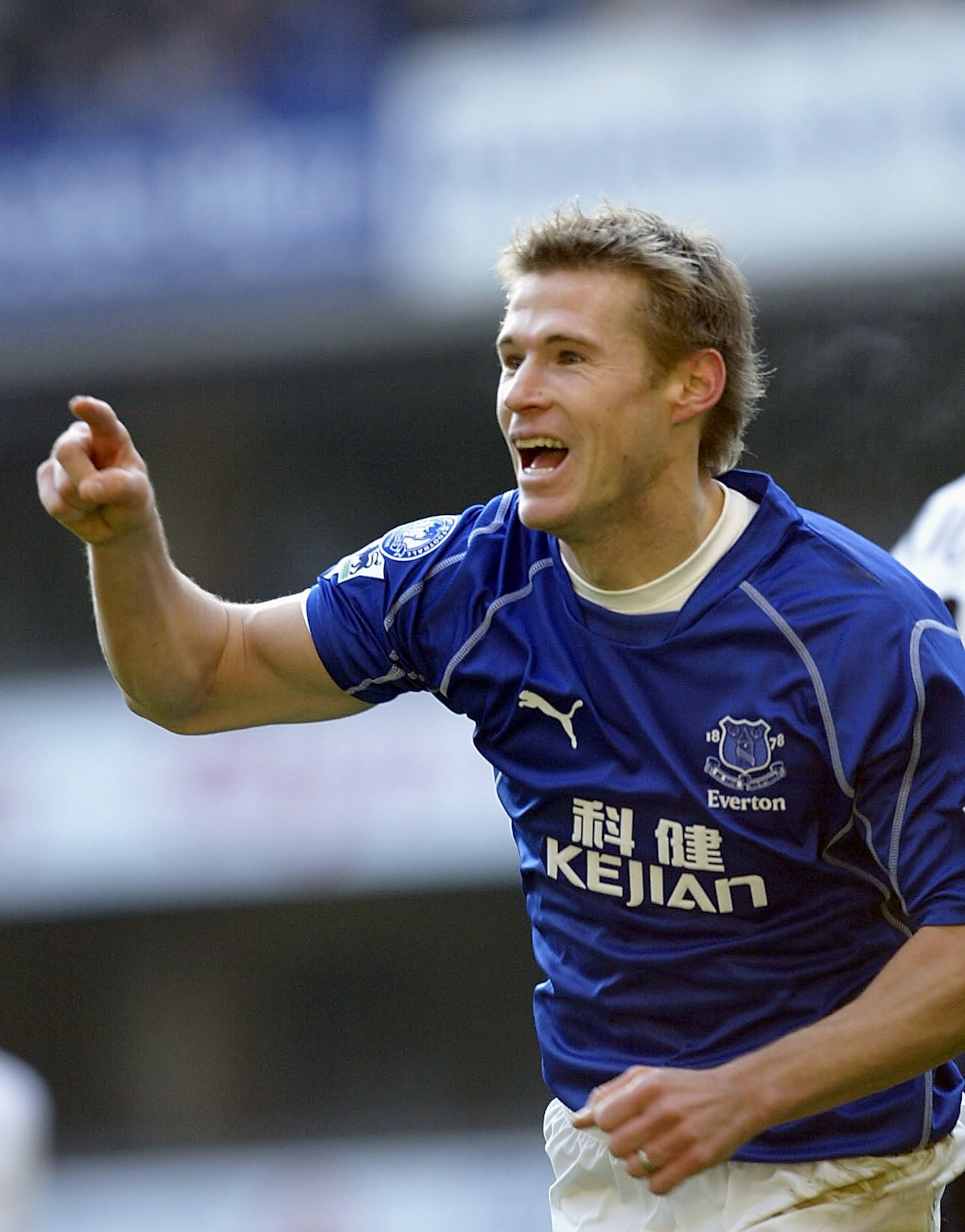 LONDON - JANUARY12:  Brian McBride of Everton celebrates scoring the first goal during the FA Barclaycard Premiership match between Tottenham Hotspur and Everton at White Hart Lane, London on January 12, 2003. (Photo by David Cannon/Getty Images)