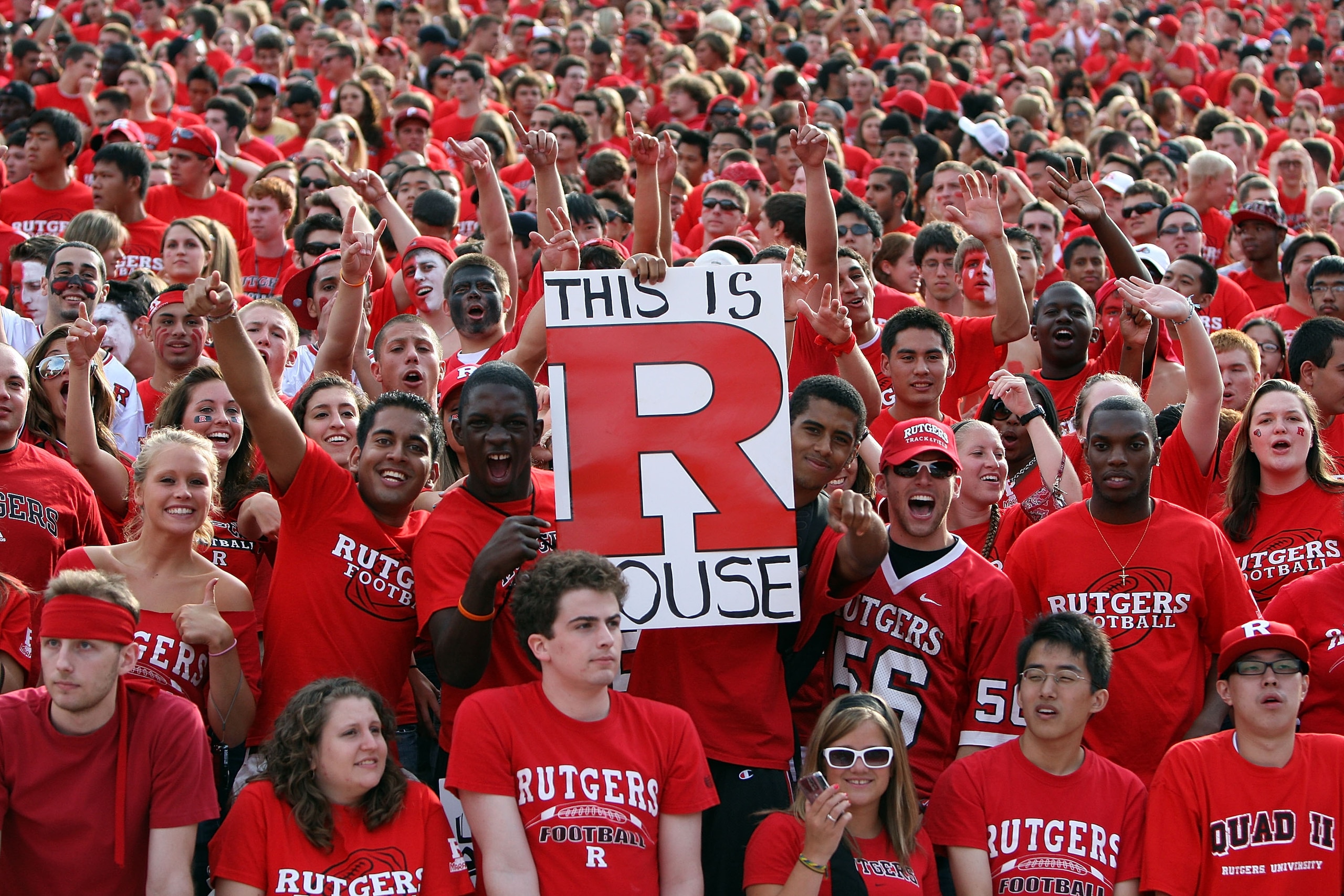 PISCATAWAY, NJ - SEPTEMBER 07:  Rutgers Scarlet Knights fans cheer for their team before a game against the Cincinnati Bearcats at Rutgers Stadium on September 7, 2009 in Piscataway, New Jersey.  (Photo by Jim McIsaac/Getty Images)