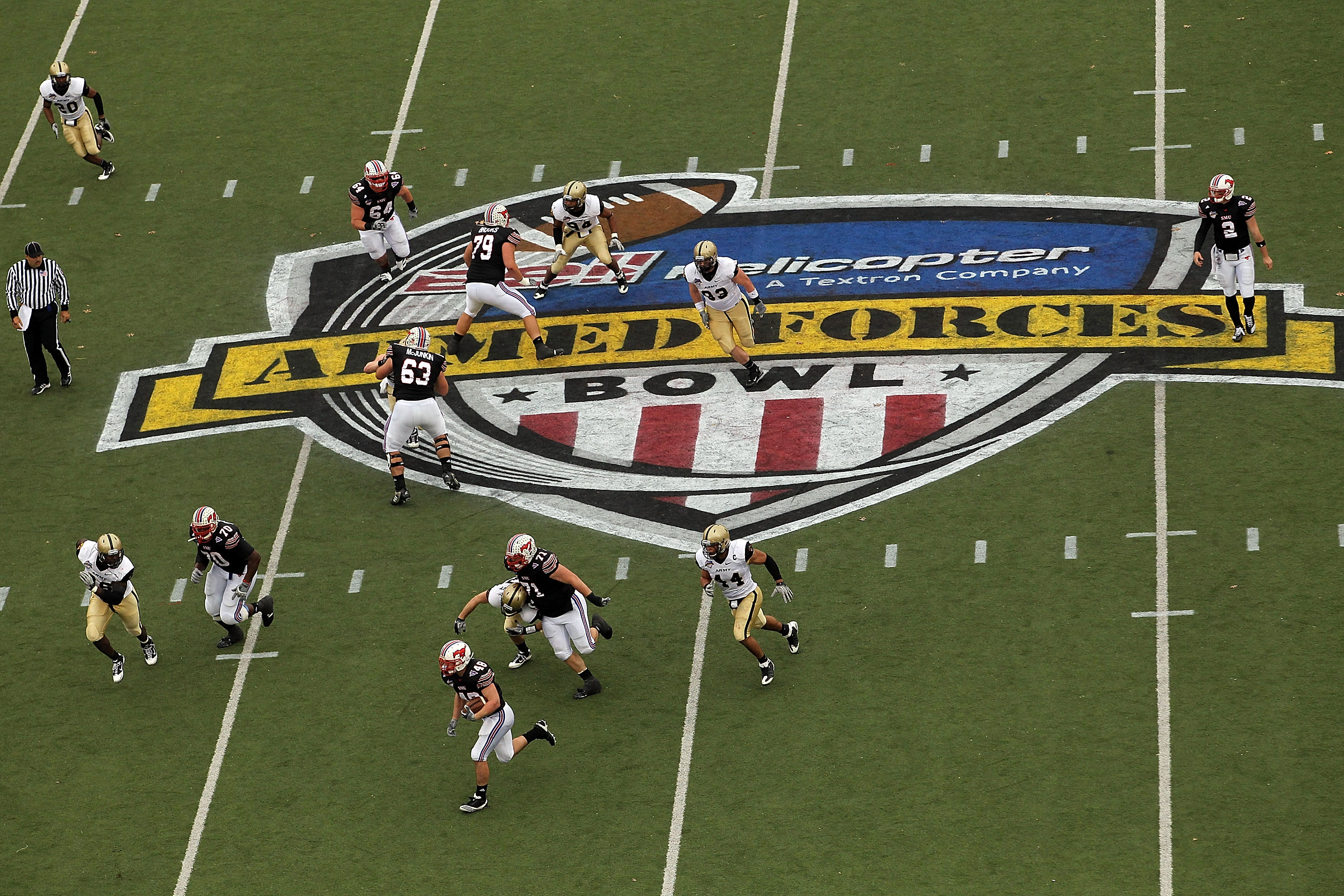 DALLAS, TX - DECEMBER 30:  Running back  Zach Line #48 of the SMU Mustangs runs the ball against the Army Black Knights during the Bell Helicopter Armed Forces Bowl at Gerald J. Ford Stadium on December 30, 2010 in Dallas, Texas.  (Photo by Ronald Martine