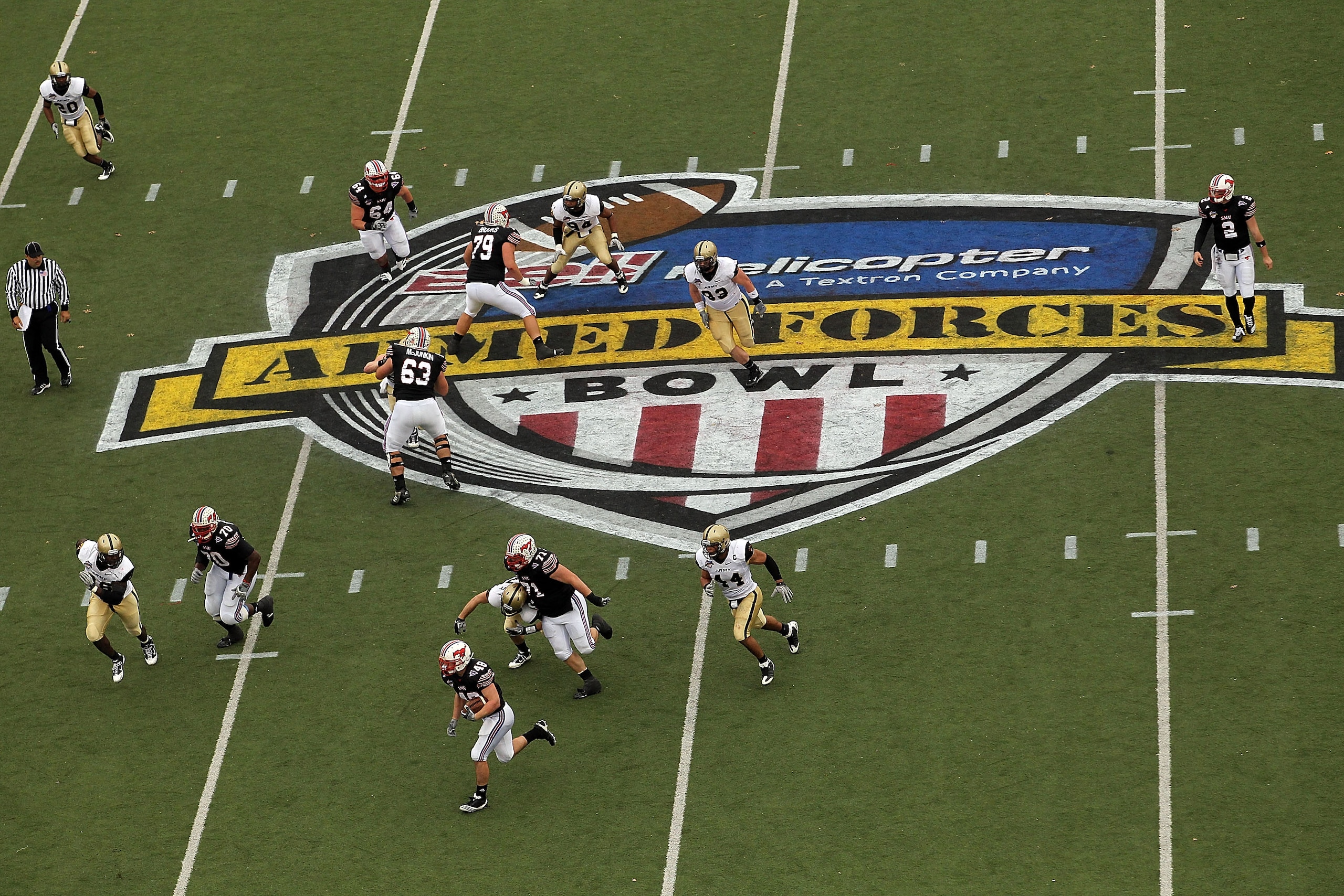 DALLAS, TX - DECEMBER 30:  Running back  Zach Line #48 of the SMU Mustangs runs the ball against the Army Black Knights during the Bell Helicopter Armed Forces Bowl at Gerald J. Ford Stadium on December 30, 2010 in Dallas, Texas.  (Photo by Ronald Martine