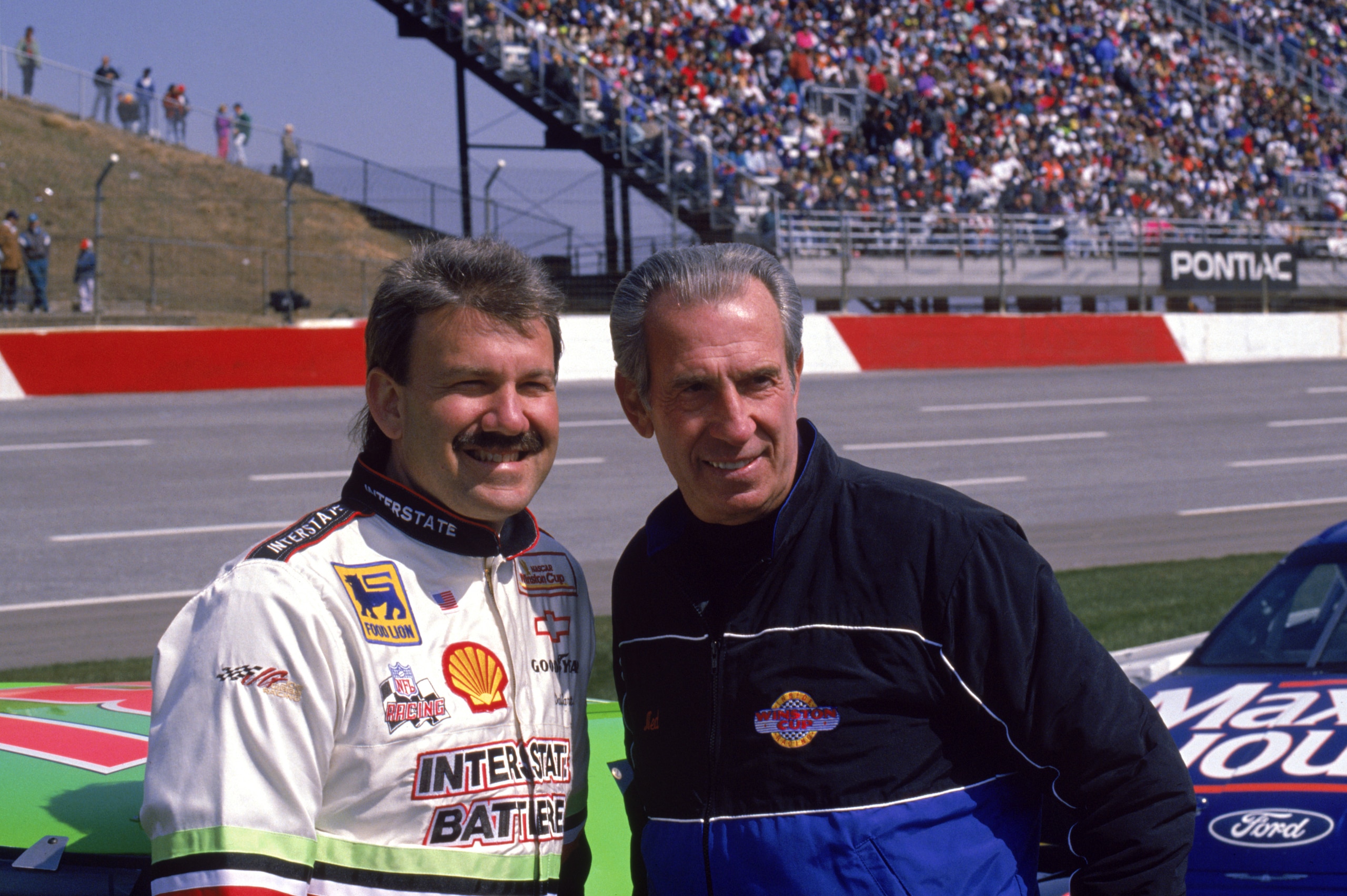1993:  Dale Jarrett (L) and Ned Jarrett poses for a picture during the 1993 season. (Photo by Bill Hall/Getty Images)