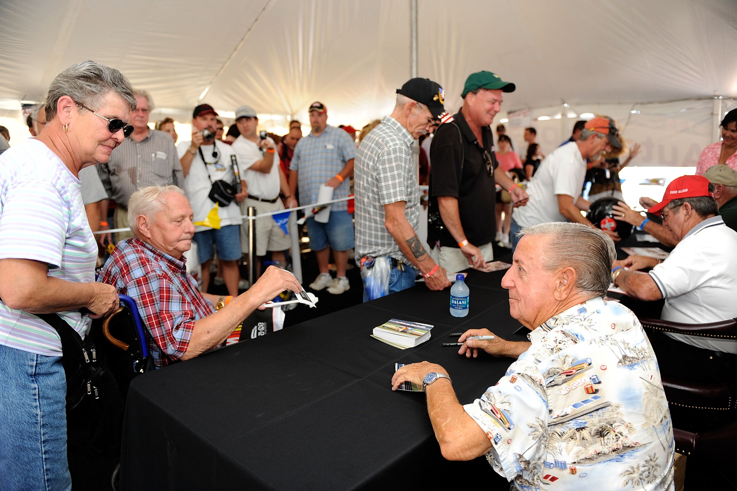 DARLINGTON, SC - SEPTEMBER 27:  NASCAR legend Rex White signs autographs during the Darlington Historic Racing Festival on September 27, 2009 at Darlington Raceway in Darlington, South Carolina.  (Photo by Rusty Jarrett/Getty Images)