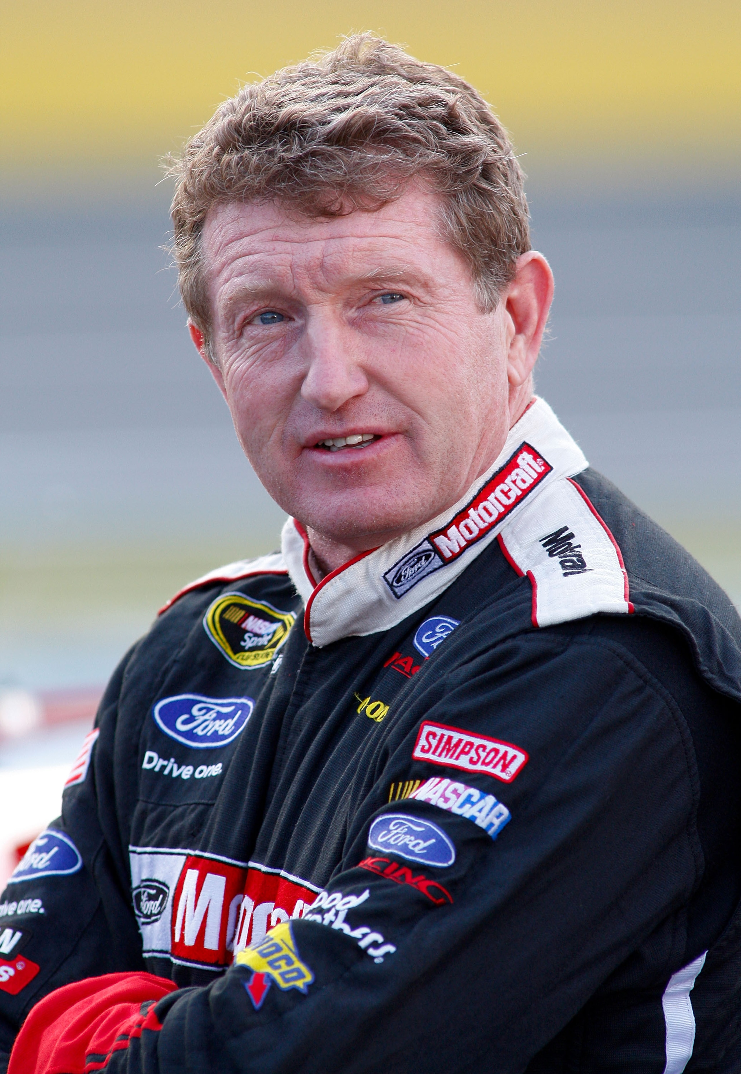 CONCORD, NC - MAY 21:  Bill Elliott, driver of the #21 Motorcraft Ford, stands on the grid during qualifying for the NASCAR Sprint Cup Series Coca-Cola 600 on May 21, 2009 at Lowe's Motor Speedway in Concord, North Carolina.  (Photo by Geoff Burke/Getty I