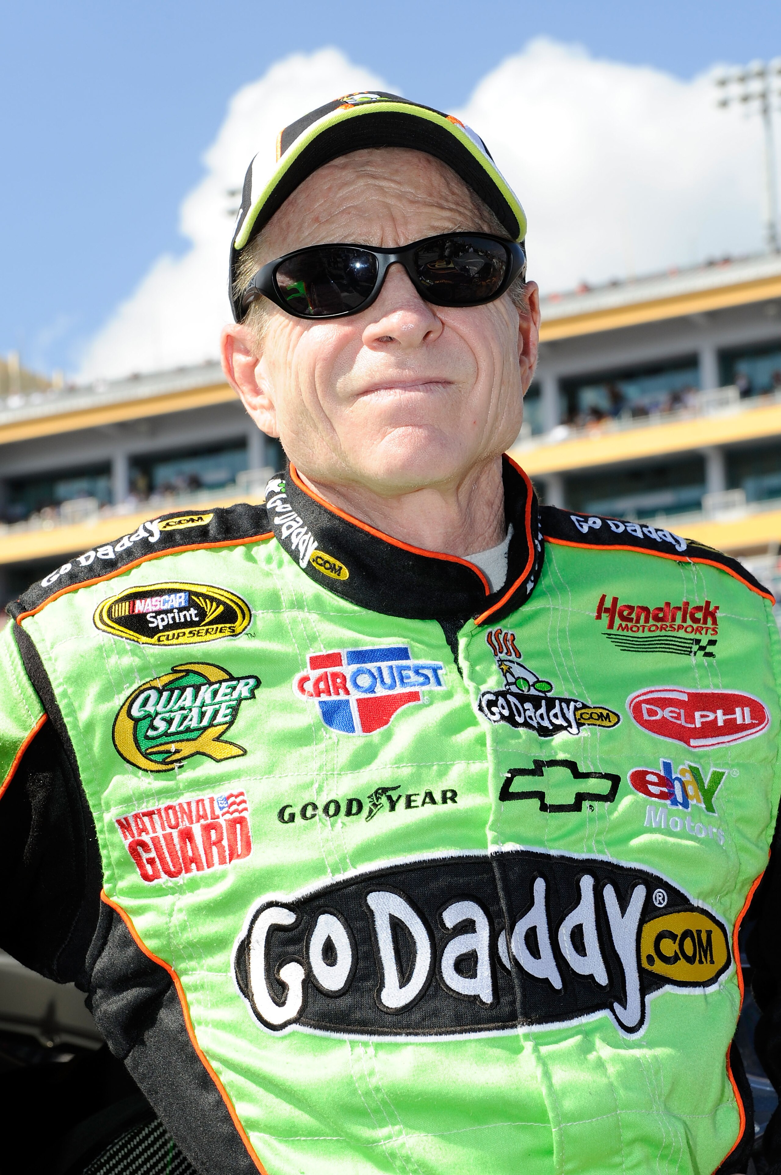 HOMESTEAD, FL - NOVEMBER 21:  Mark Martin, driver of the #5 GoDaddy.com Chevrolet, stands on pit road prior to the NASCAR Sprint Cup Series Ford 400 at Homestead-Miami Speedway on November 21, 2010 in Homestead, Florida.  (Photo by John Harrelson/Getty Im
