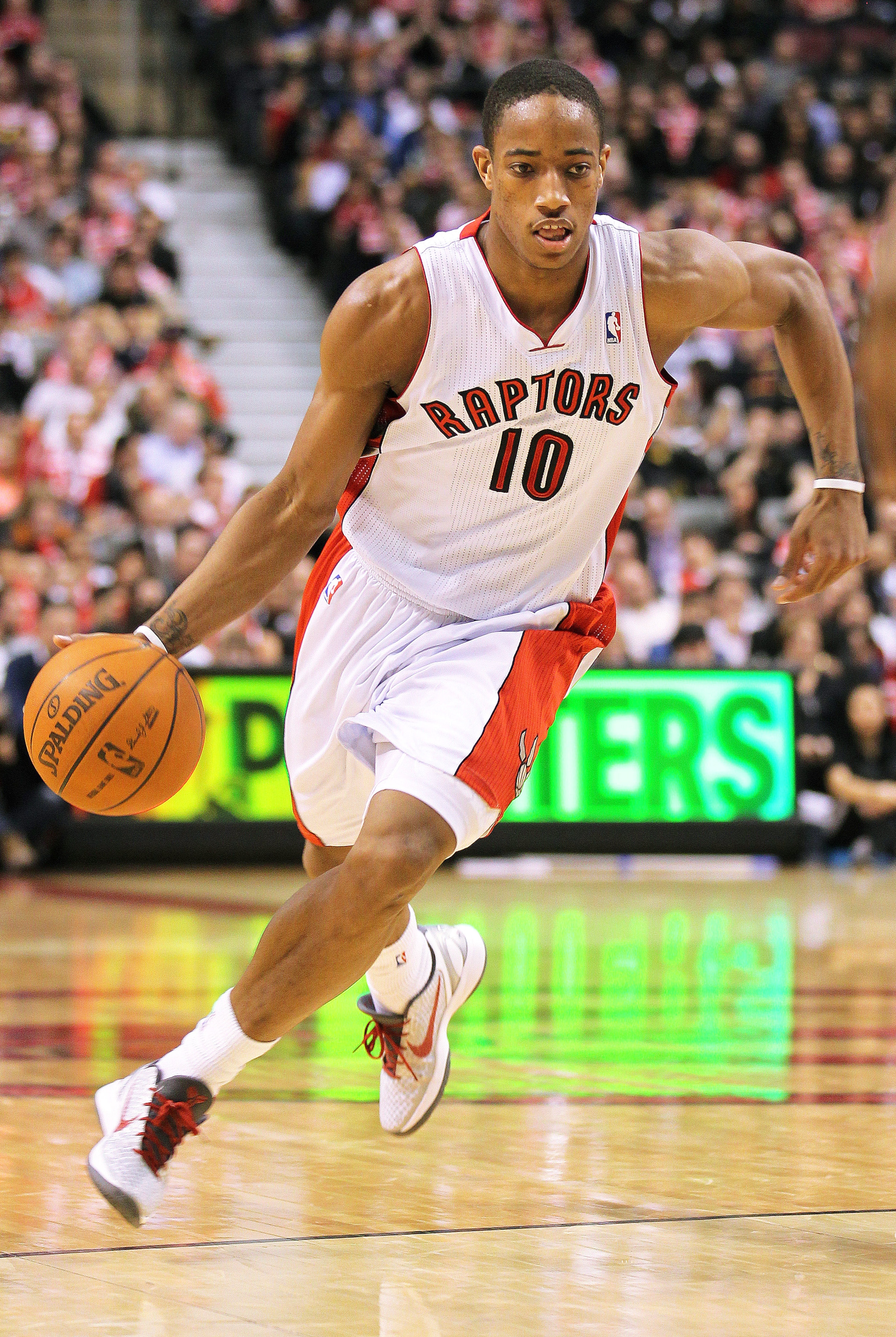TORONTO, CANADA - FEBRUARY 16:  DeMar DeRozan #10 of the Toronto Raptors drives with the ball in a game against the Miami Heat on February 16, 2011 at the Air Canada Centre in Toronto, Canada. The Heat defeated the Raptors 103-95. (Photo by Claus Andersen