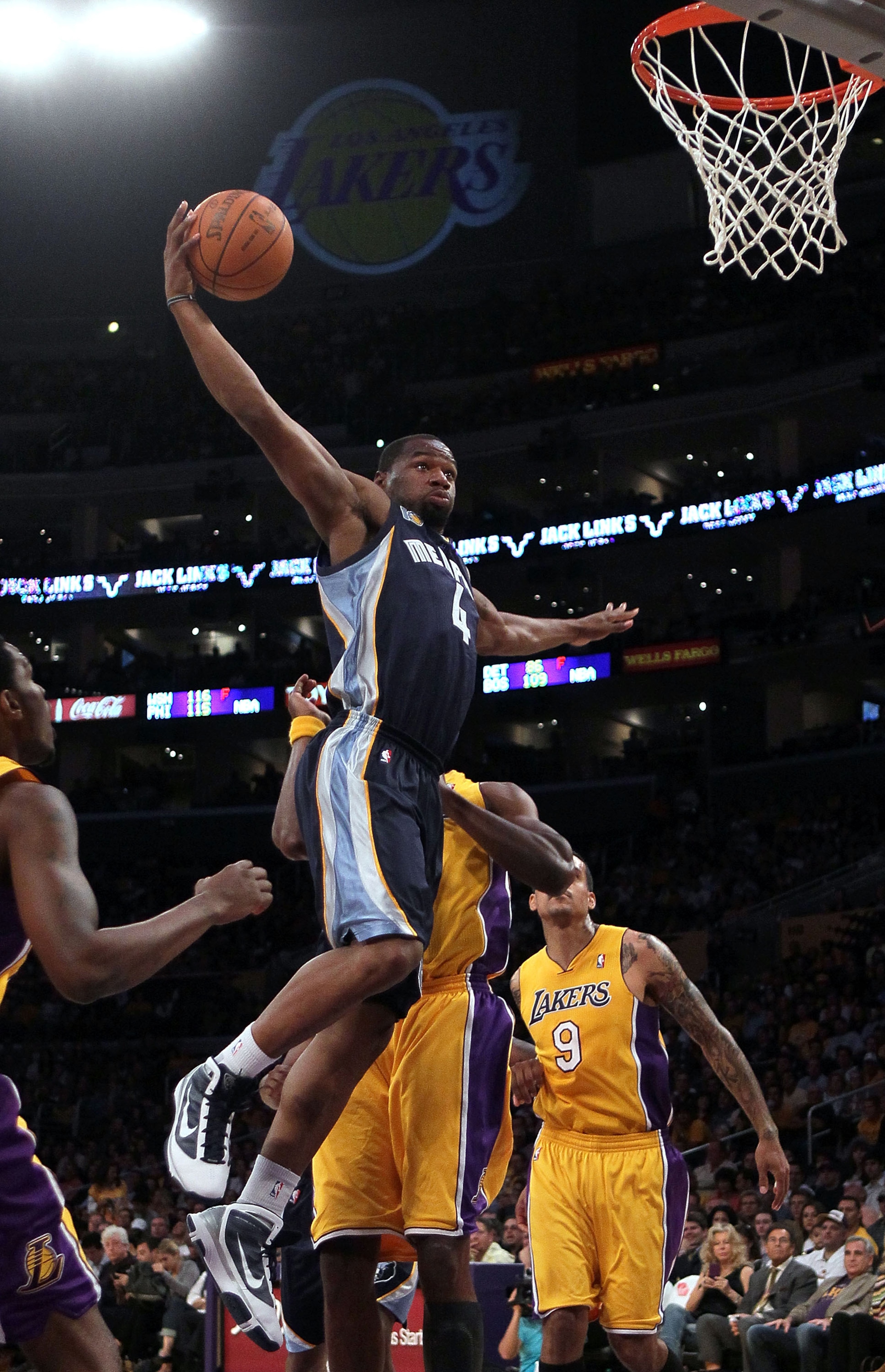 LOS ANGELES, CA - NOVEMBER 02:  Sam Young #4 of the Memphis Grizzlies goes up for a dunk against the Los Angeles Lakers during the game at Staples Center on November 2, 2010 in Los Angeles, California. The Lakers defeated the Grizzlies 124-105. NOTE TO US