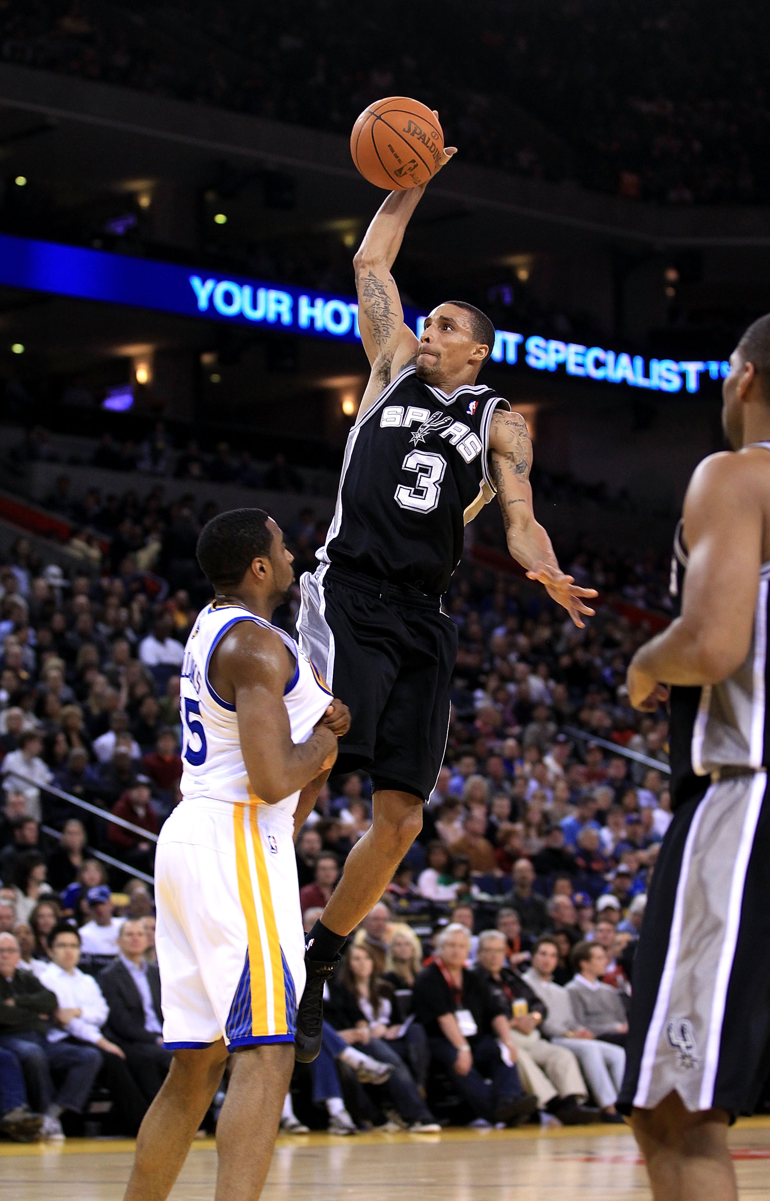 OAKLAND, CA - JANUARY 24:  George Hill #3 of the San Antonio Spurs in action against the Golden State Warriors at Oracle Arena on January 24, 2011 in Oakland, California.  NOTE TO USER: User expressly acknowledges and agrees that, by downloading and or us