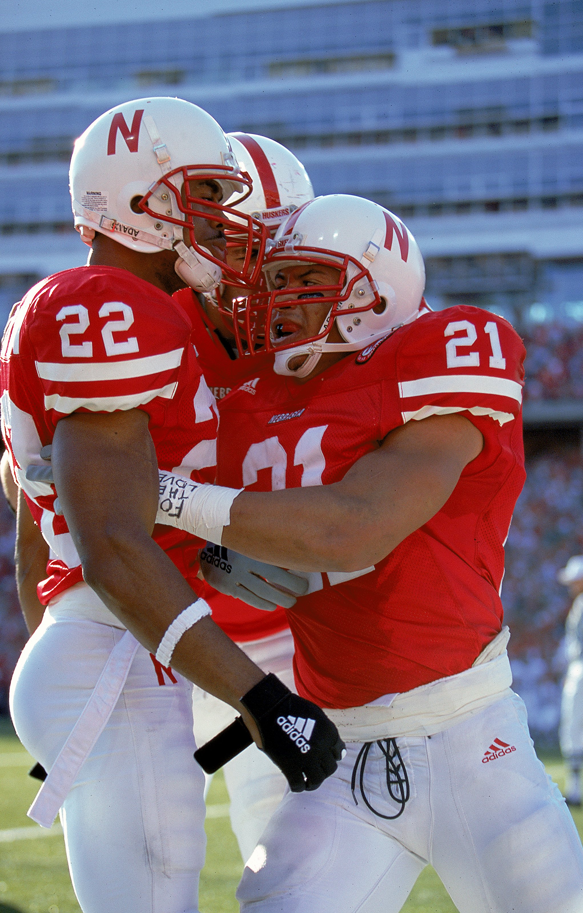 6 Nov 1999:  Mike Brown #21 of the Nebraska Cornhuskers celebrates with teammates Ralph Brown II #22 during the game against the Texas A&M Aggies at the Memorial Stadium in Lincoln, Nebraska. The Cornhuskers defeated the Aggies 37-0. Mandatory Credit: Bri