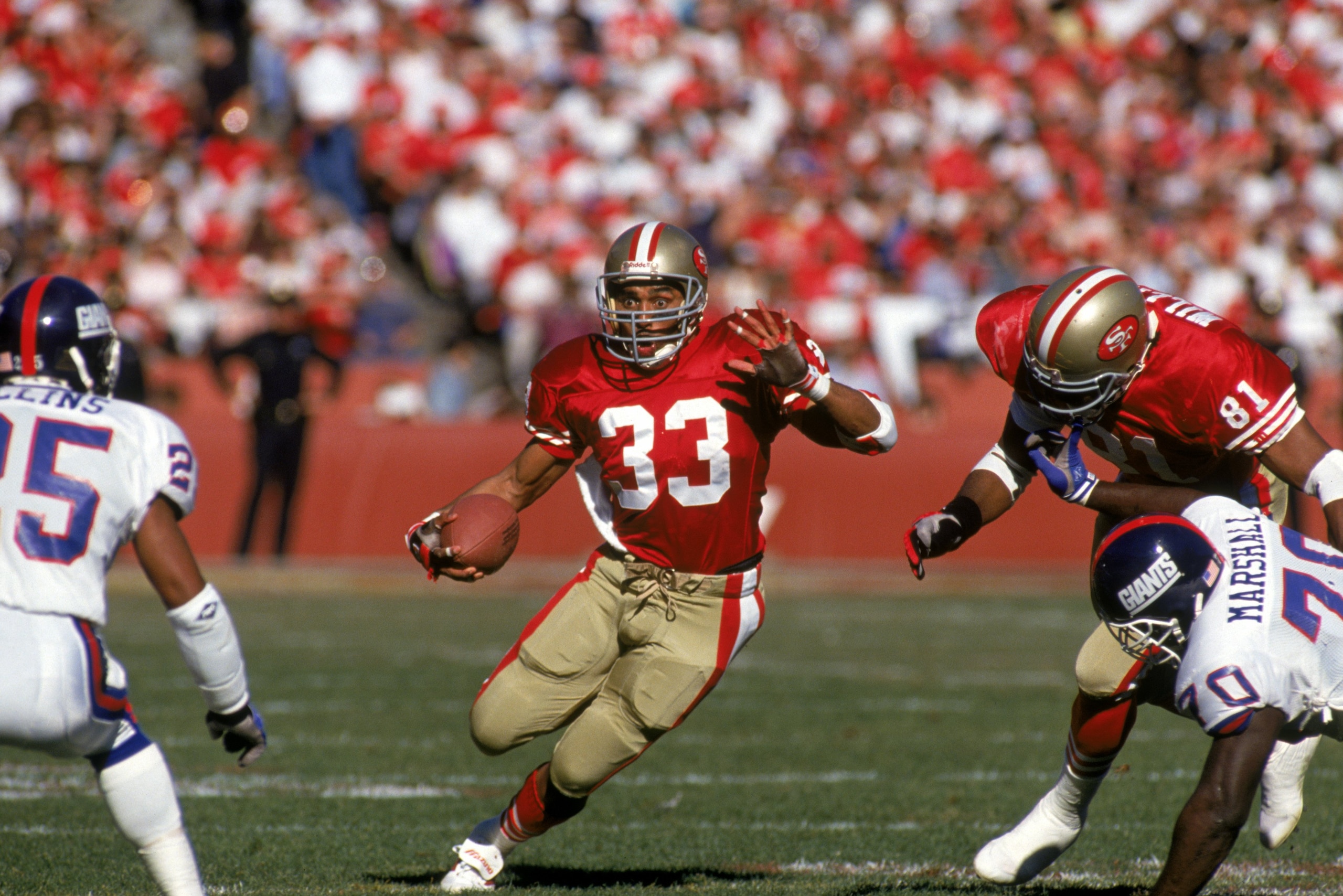 SAN FRANCISCO - JANUARY 20: Running back Roger Craig #33 of the San Francisco 49ers looks for room to run during the 1990 NFC Championship game against the New York Giants at Candlestick Park on January 20, 1991 in San Francisco, California. The Giants SAN FRANCISCO - JANUARY 20: Running back Roger Craig #33 of the San Francisco 49ers looks for room to run during the 1990 NFC Championship game against the New York Giants at Candlestick Park on January 20, 1991 in San Francisco, California. The Giants