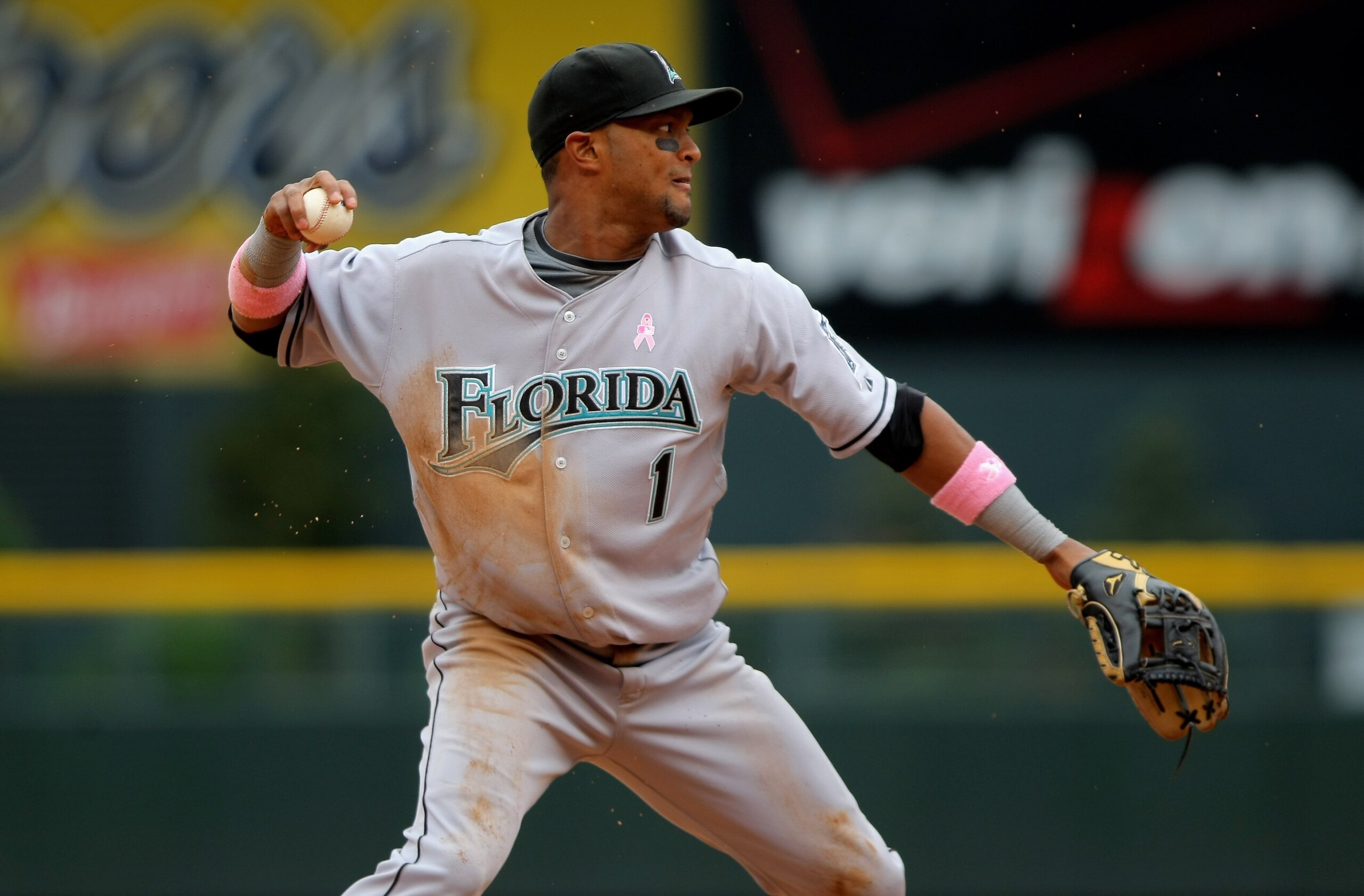 DENVER - MAY 10:  Third baseman Emilio Bonifacio #1 of the Florida Marlins throws out a runner against the Colorado Rockies during MLB action at Coors Field on May 10, 2009 in Denver, Colorado. The Rockies defeated the Marlins 3-2.  (Photo by Doug Pensing