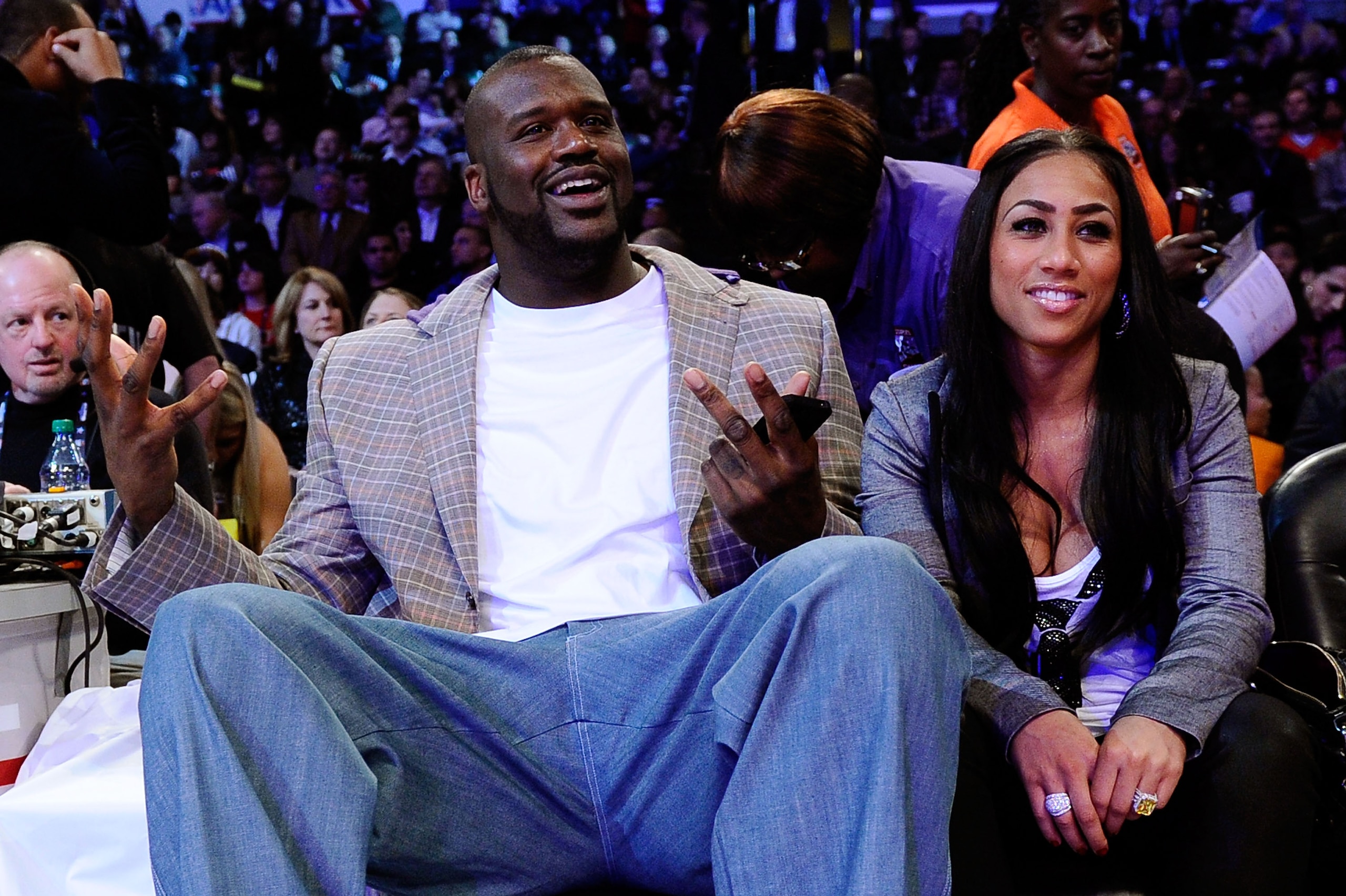 LOS ANGELES, CA - FEBRUARY 19:  Shaquille O'Neal of the Boston Celtics with girlfriend Nicole 'Hoopz' Alexander sit courtside as they attend NBA All-Star Saturday night presented by State Farm at Staples Center on February 19, 2011 in Los Angeles, Califor