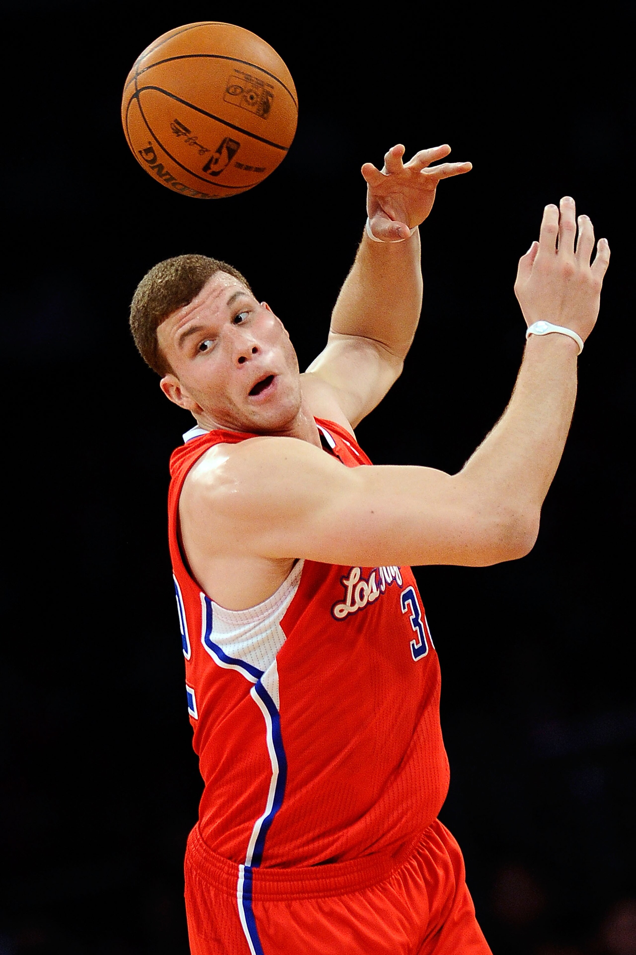 LOS ANGELES, CA - FEBRUARY 18:  Blake Griffin #32 of the Los Angeles Clippers and the Rookie Team goes after a loose ball in the second half during the T-Mobile Rookie Challenge and Youth Jam at Staples Center on February 18, 2011 in Los Angeles, Californ