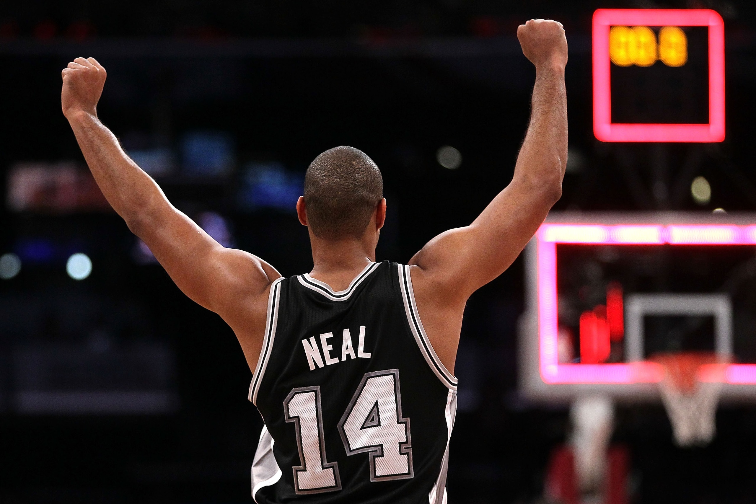 LOS ANGELES, CA - FEBRUARY 18:  Gary Neal #14 of the San Antonio Spurs and the Rookie Team reacts after the Rookie Team's 148-140 victory against the Sophomore Team during the T-Mobile Rookie Challenge and Youth Jam at Staples Center on February 18, 2011