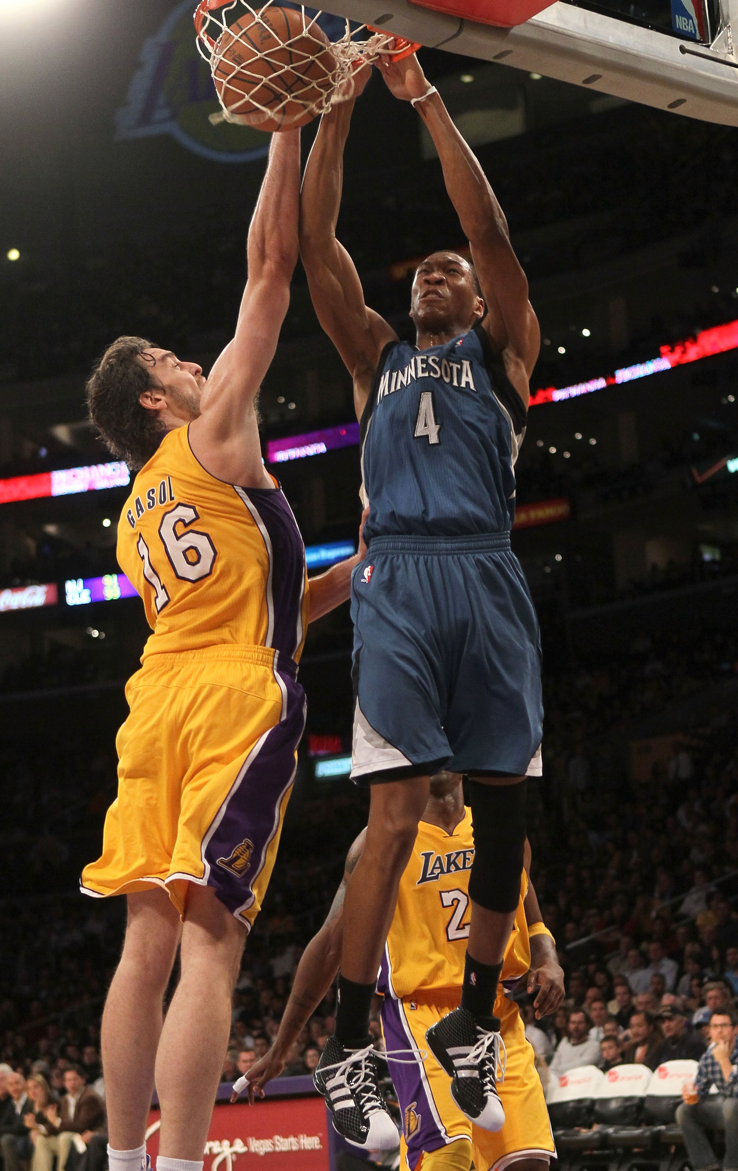 LOS ANGELES - NOVEMBER 9:  Wes Johnson #4 of the Minnesota Timberwolves dunks over Pau Gasol #16 of the Los Angeles Lakers at Staples Center on November 9, 2010 in Los Angeles, California. The Lakers won 99-94.   NOTE TO USER: User expressly acknowledges