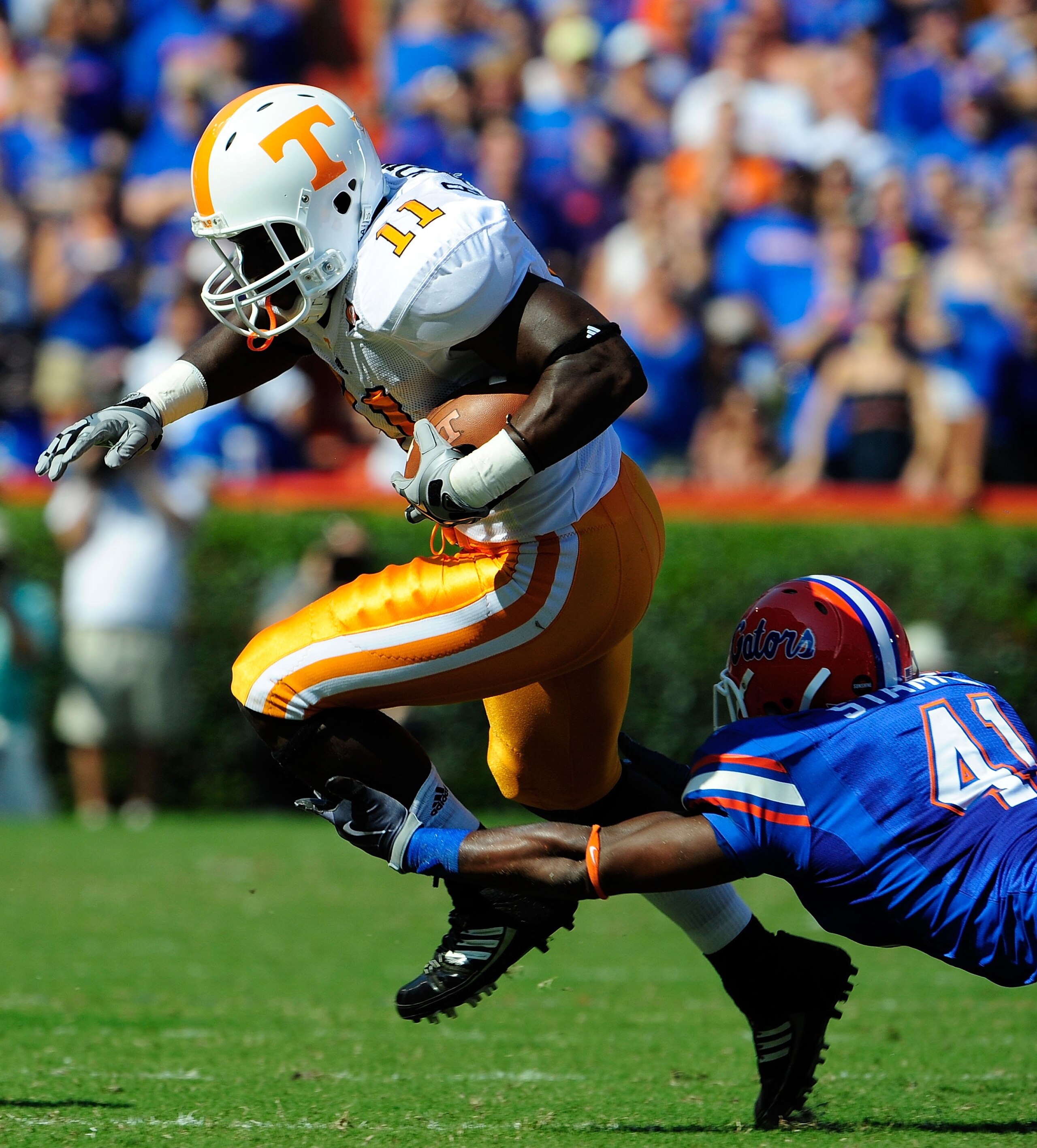 GAINESVILLE, FL - SEPTEMBER 19:  Bryce Brown #11 of the Tennessee Volunteers is tackled by Ryan Stamper #41 of the Florida Gators during the game at Ben Hill Griffin Stadium on September 19, 2009 in Gainesville, Florida.  (Photo by Sam Greenwood/Getty Ima