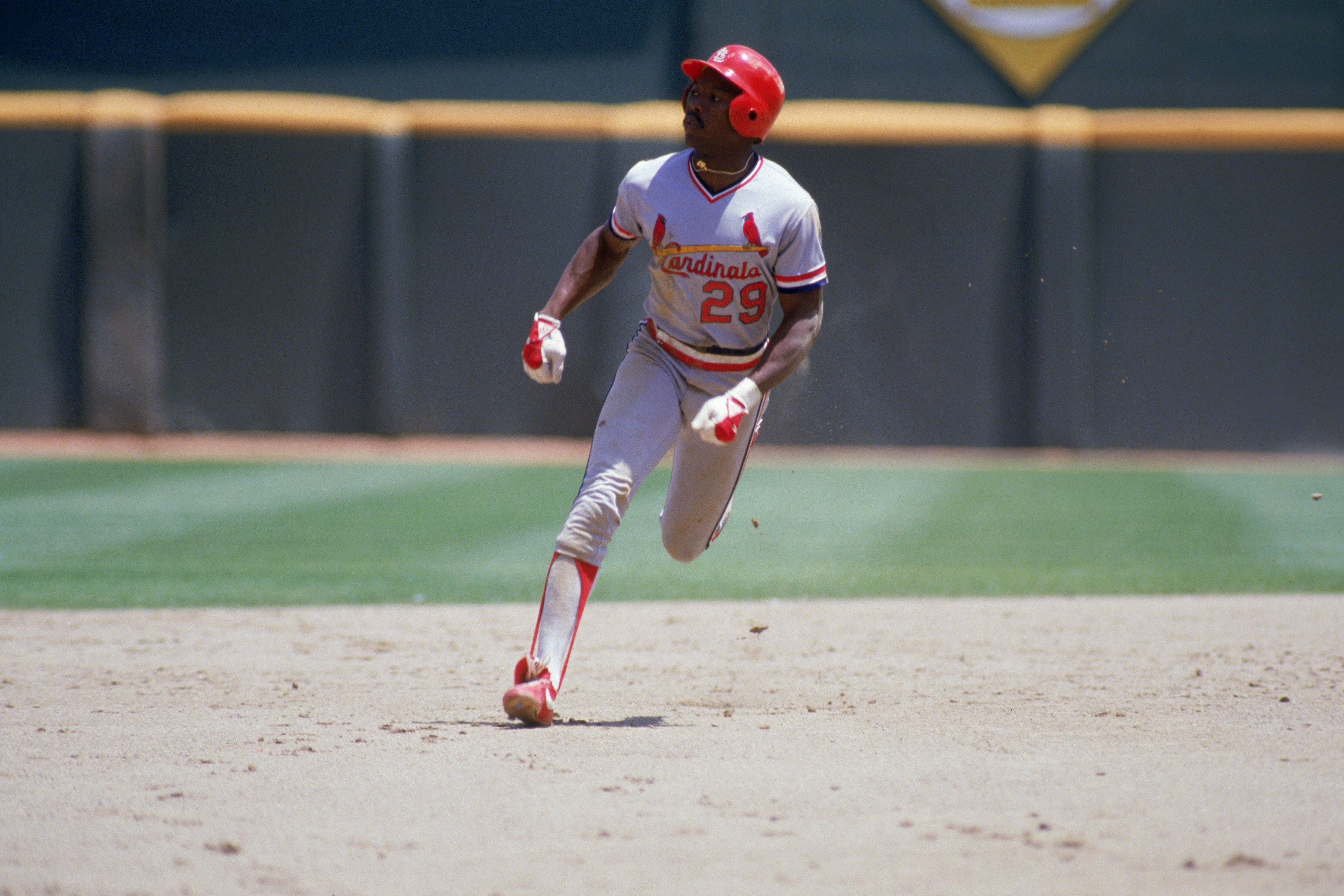 SAN DIEGO - 1985:  Vince Coleman #29 of the St. Louis Cardinals runs between bases during a game against the San Diego Padres in 1985 at Jack Murphy Stadium in San Diego, California.  (Photo by Stephen Dunn/Getty Images)