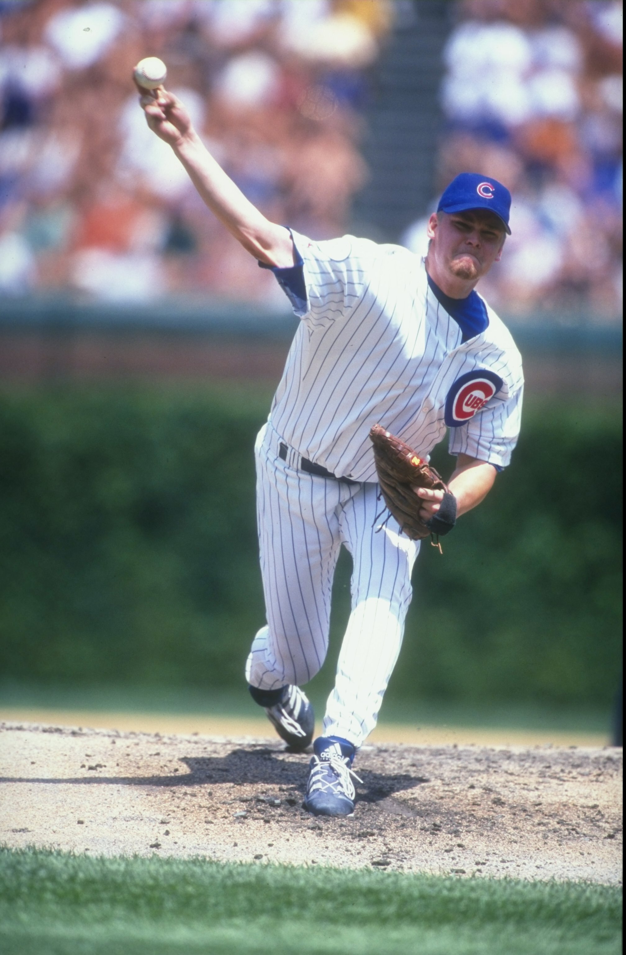 26 Jul 1998:  Pitcher Kerry Wood #34 of the Chicago Cubs in action during a game against the New York Mets at Wrigley Field in Chicago, Illinois. The Cubs defeated the Mets 3-1. Mandatory Credit: Jonathan Daniel  /Allsport