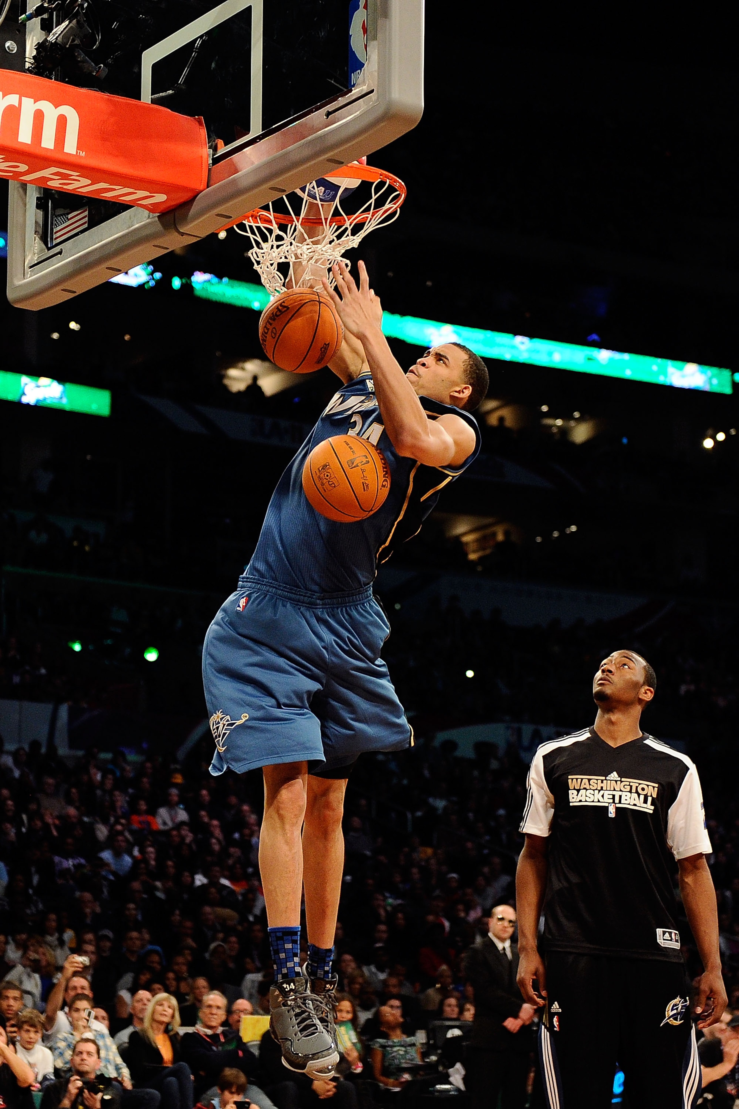 LOS ANGELES, CA - FEBRUARY 19:  JaVale McGee #34 of the Washington Wizards dunks three balls on the same jump after a pass from teammate John Wall #2 in the second round of the Sprite Slam Dunk Contest apart of NBA All-Star Saturday Night at Staples Cente