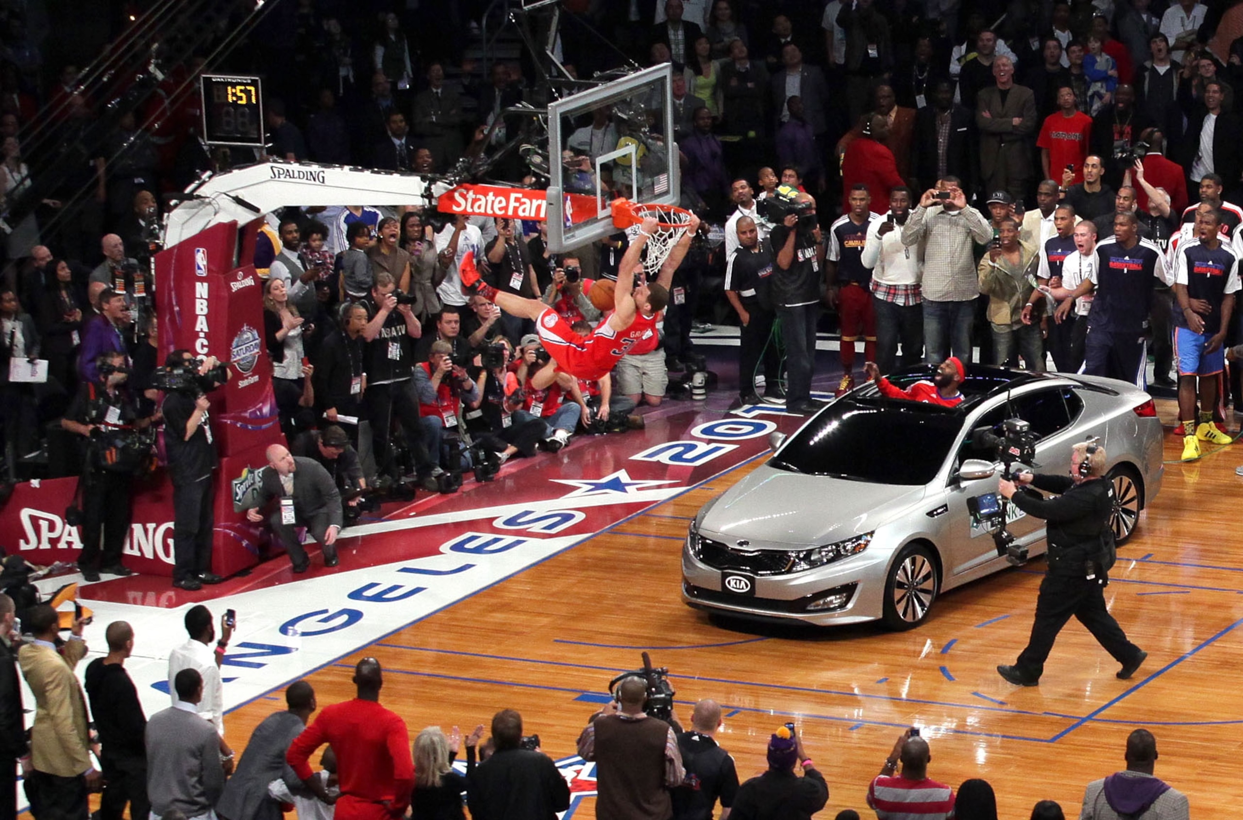 LOS ANGELES, CA - FEBRUARY 19:  Blake Griffin #32 of the Los Angeles Clippers dunks the ball over a car in the final round of the Sprite Slam Dunk Contest apart of NBA All-Star Saturday Night at Staples Center on February 19, 2011 in Los Angeles, Californ