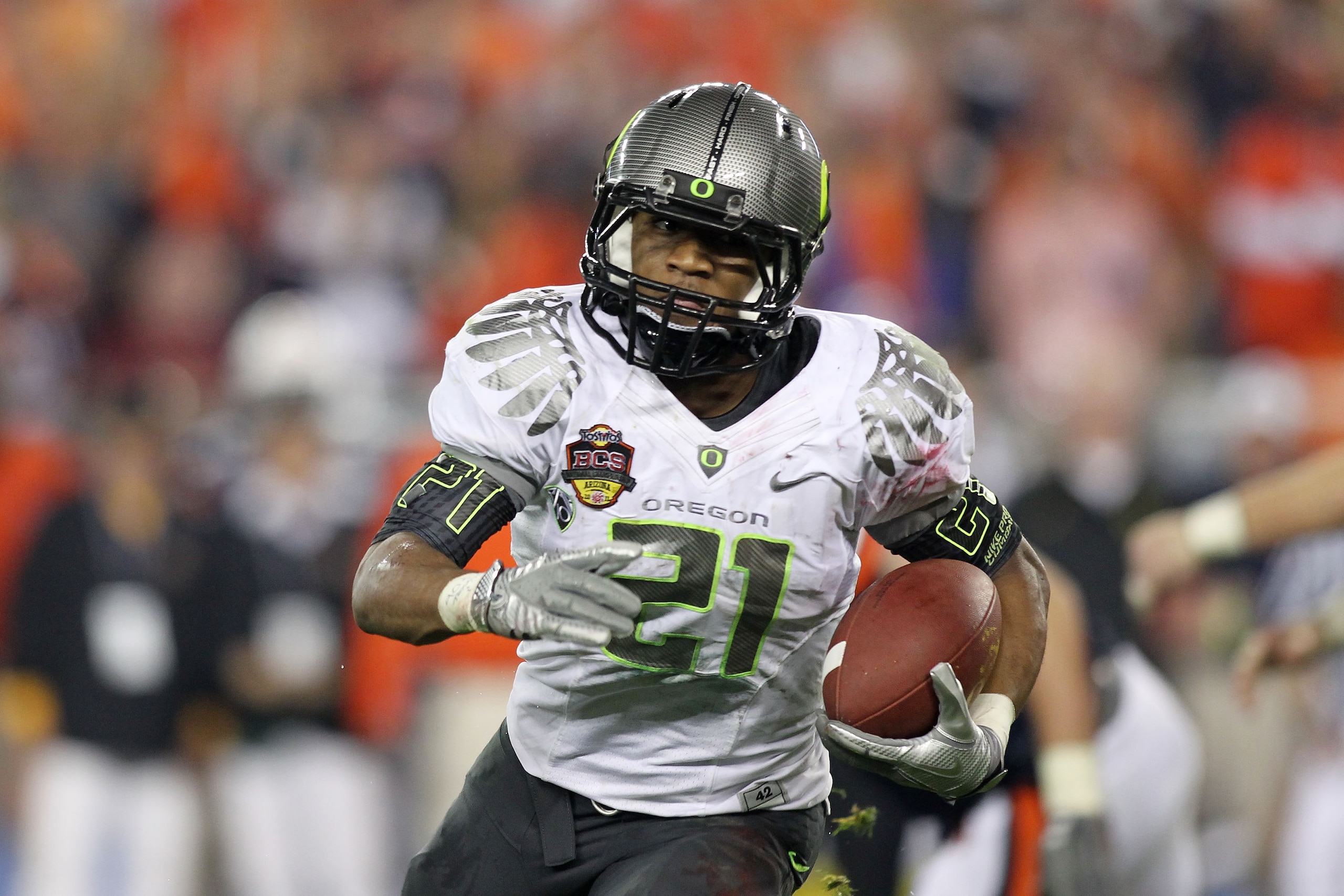 GLENDALE, AZ - JANUARY 10:  LaMichael James #21 of the Oregon Ducks runs down field against the Auburn Tigers during the Tostitos BCS National Championship Game at University of Phoenix Stadium on January 10, 2011 in Glendale, Arizona.  (Photo by Jonathan