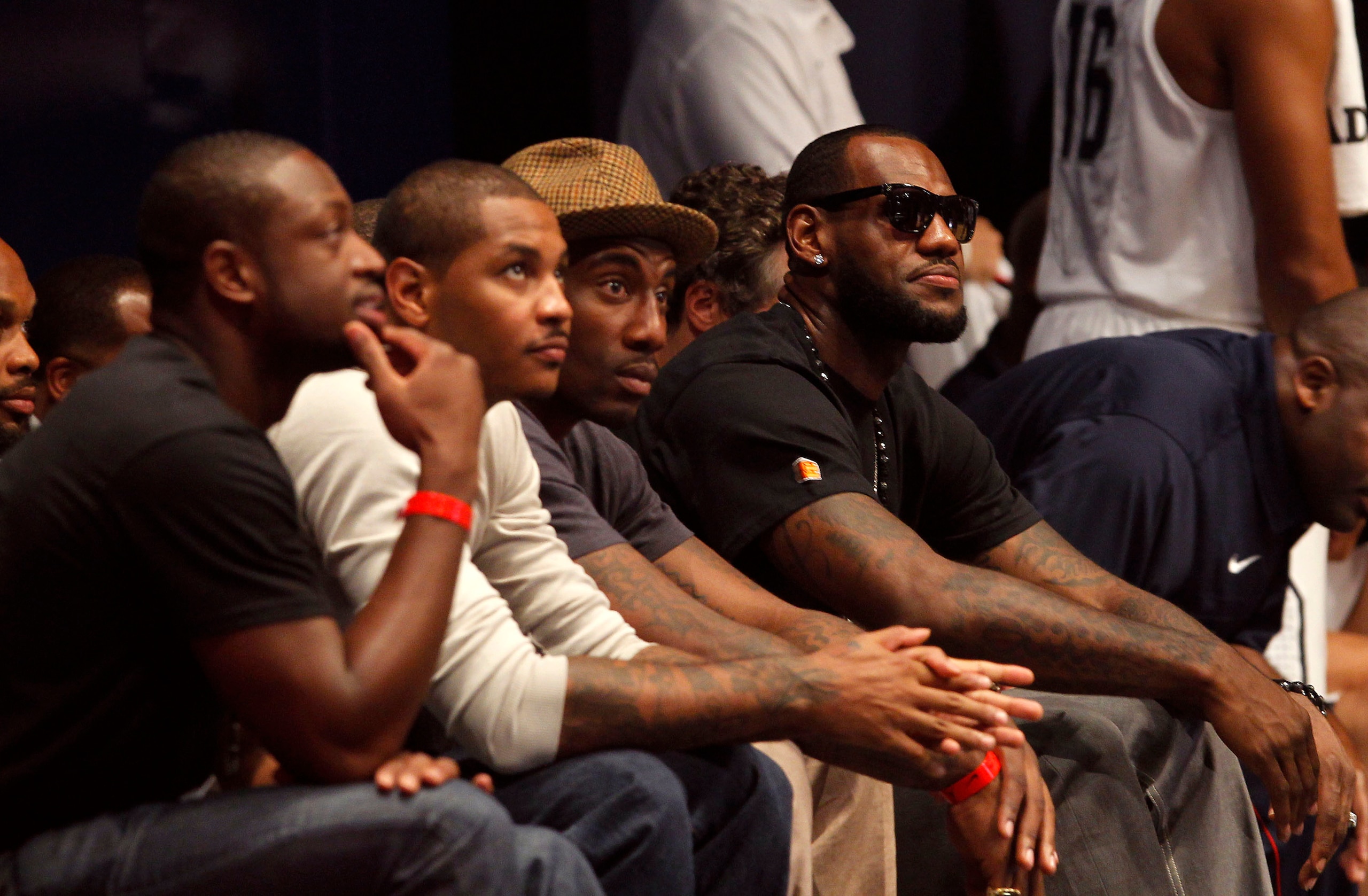 NEW YORK CITY, NY - AUGUST 12:  (L-R) Dwyane Wade, Carmelo Anthony, Amar'e Stoudemire and LeBron James look on during the World Basketball Festival USAB Showcase at Radio City Music Hall on August 12, 2010 in New York City.  (Photo by Chris Trotman/Getty