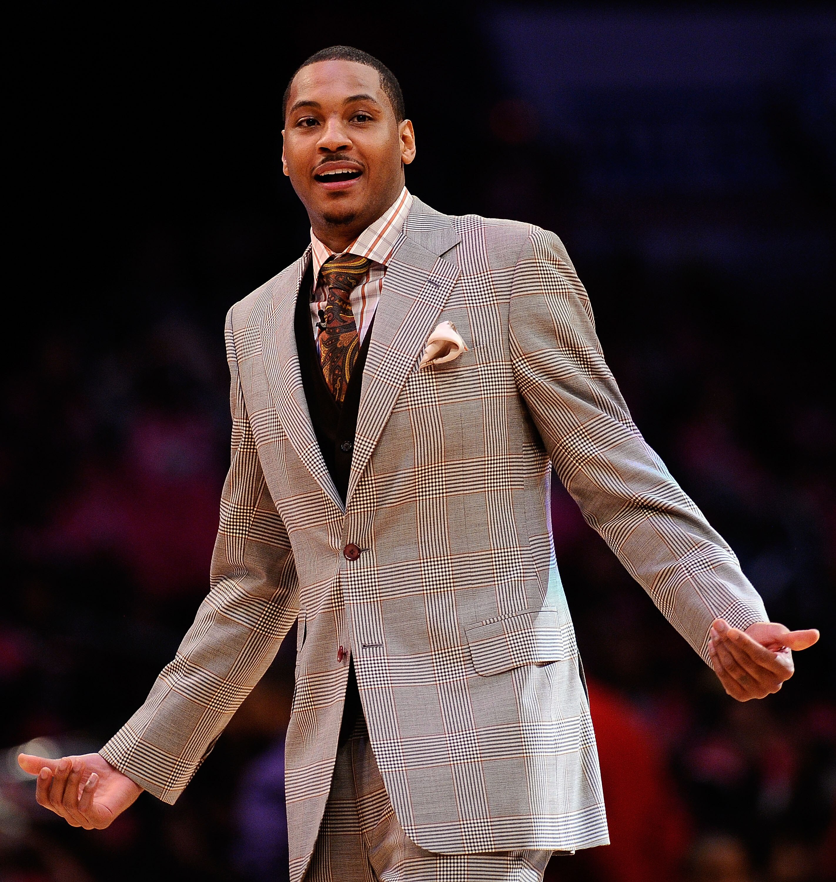 LOS ANGELES, CA - FEBRUARY 18:  Carmelo Anthony of the Denver Nuggets reacts as he takes his seat to watch the T-Mobile Rookie Challenge and Youth Jam at Staples Center on February 18, 2011 in Los Angeles, California.  (Photo by Kevork Djansezian/Getty Im