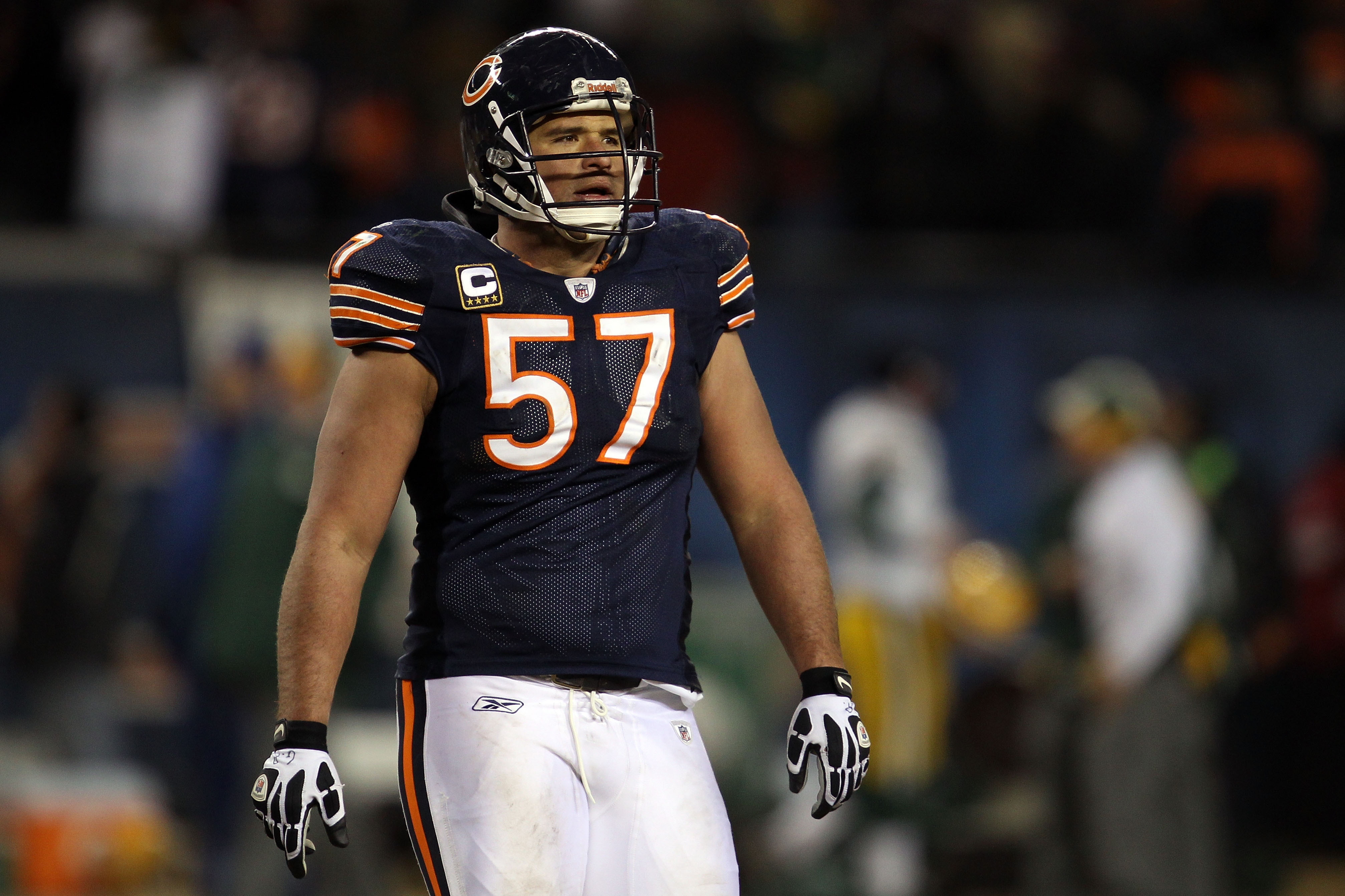 CHICAGO, IL - JANUARY 23:  Olin Kreutz #57 of the Chicago Bears looks on late in the fourth quarter against the Green Bay Packers in the NFC Championship Game at Soldier Field on January 23, 2011 in Chicago, Illinois.  (Photo by Jonathan Daniel/Getty Imag