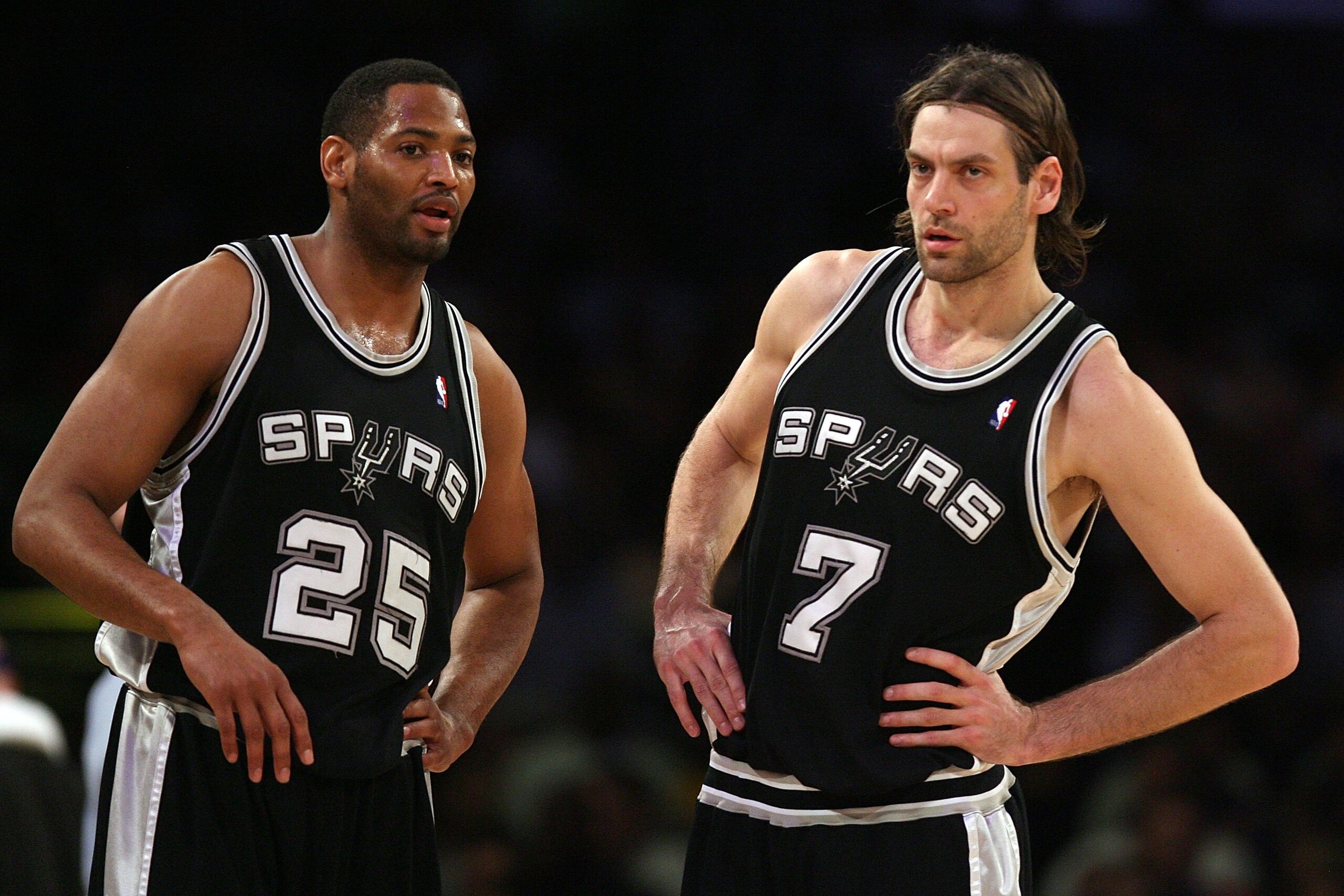 LOS ANGELES, CA - MAY 21:  Robert Horry #25 and Fabricio Oberto #7 of the San Antonio Spurs look on while taking on the Los Angeles Lakers in Game One of the Western Conference Finals during the 2008 NBA Playoffs on May 21, 2008 at Staples Center in Los A