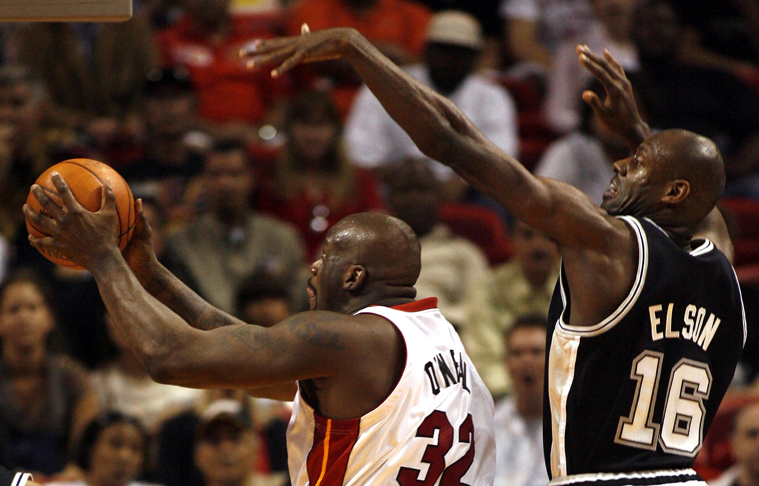 MIAMI - FEBRUARY 11:  Center Shaquille O'Neal #32 of the Miami Heat sets up to shoot against Francisco Elson #16 of the San Antonio Spurs on February 11, 2007 at the American Airlines Arena in Miami  Florida.  NOTE TO USER: User expressly acknowledges and