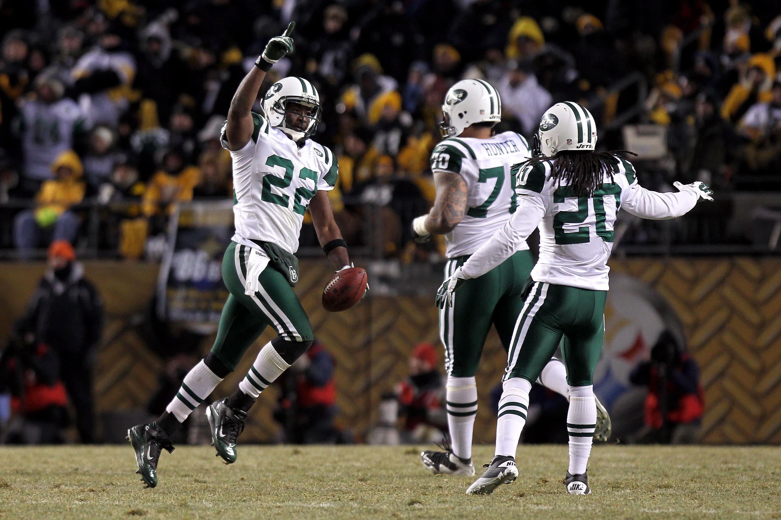 PITTSBURGH, PA - JANUARY 23:  Brodney Pool #22 of the New York Jets celebrates after intercepting a pass intended for Emmanuel Sanders #88 of the Pittsburgh Steelers in the third quarter of the 2011 AFC Championship game at Heinz Field on January 23, 2011