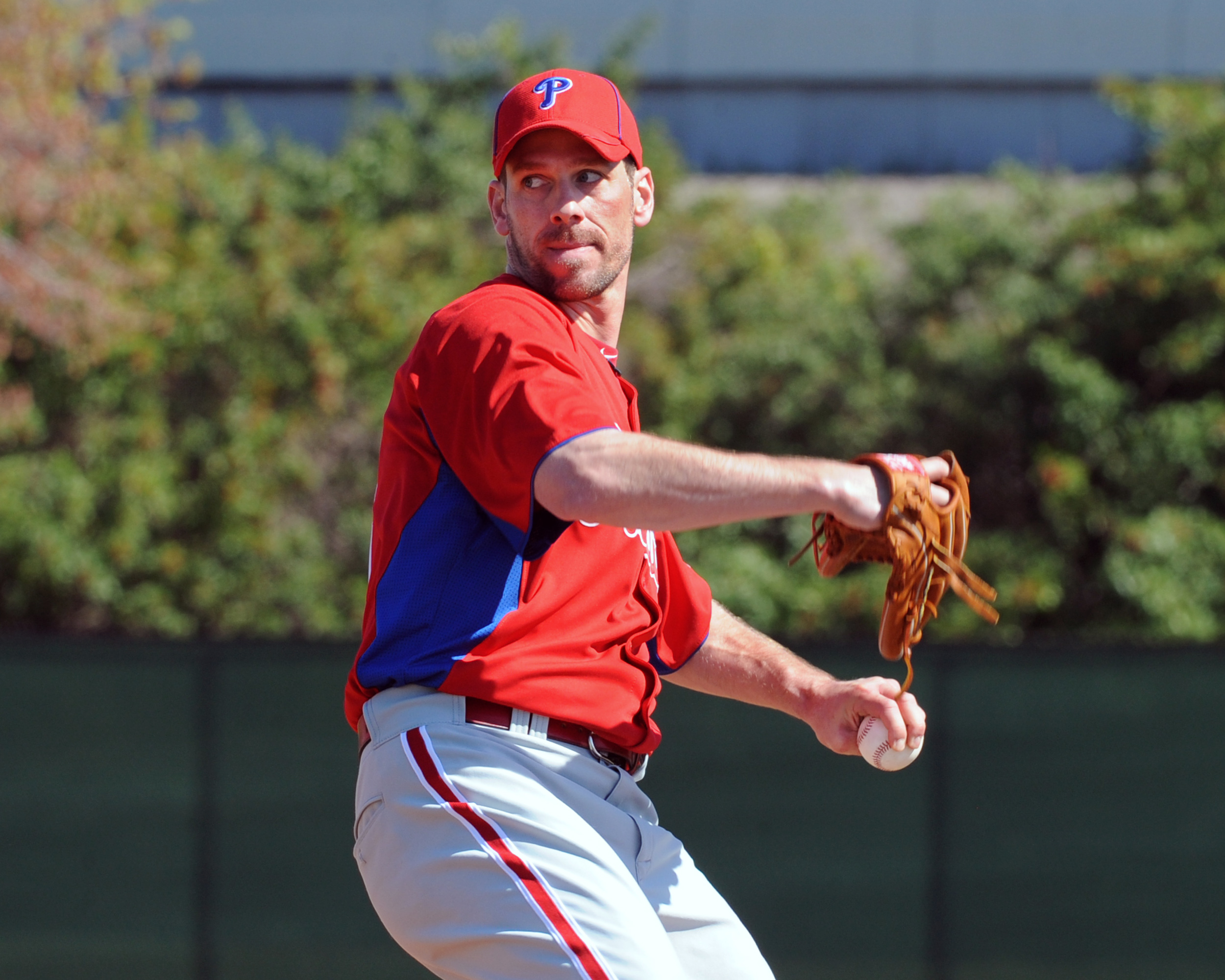 CLEARWATER, FL - FEBRUARY 19:  Pitcher Cliff Lee #33 of the Philadelphia Phillies throws from the mound during a spring training workout February 19, 2011 the Carpenter Complex at Bright House Field in Clearwater, Florida. (Photo by Al Messerschmidt/Getty