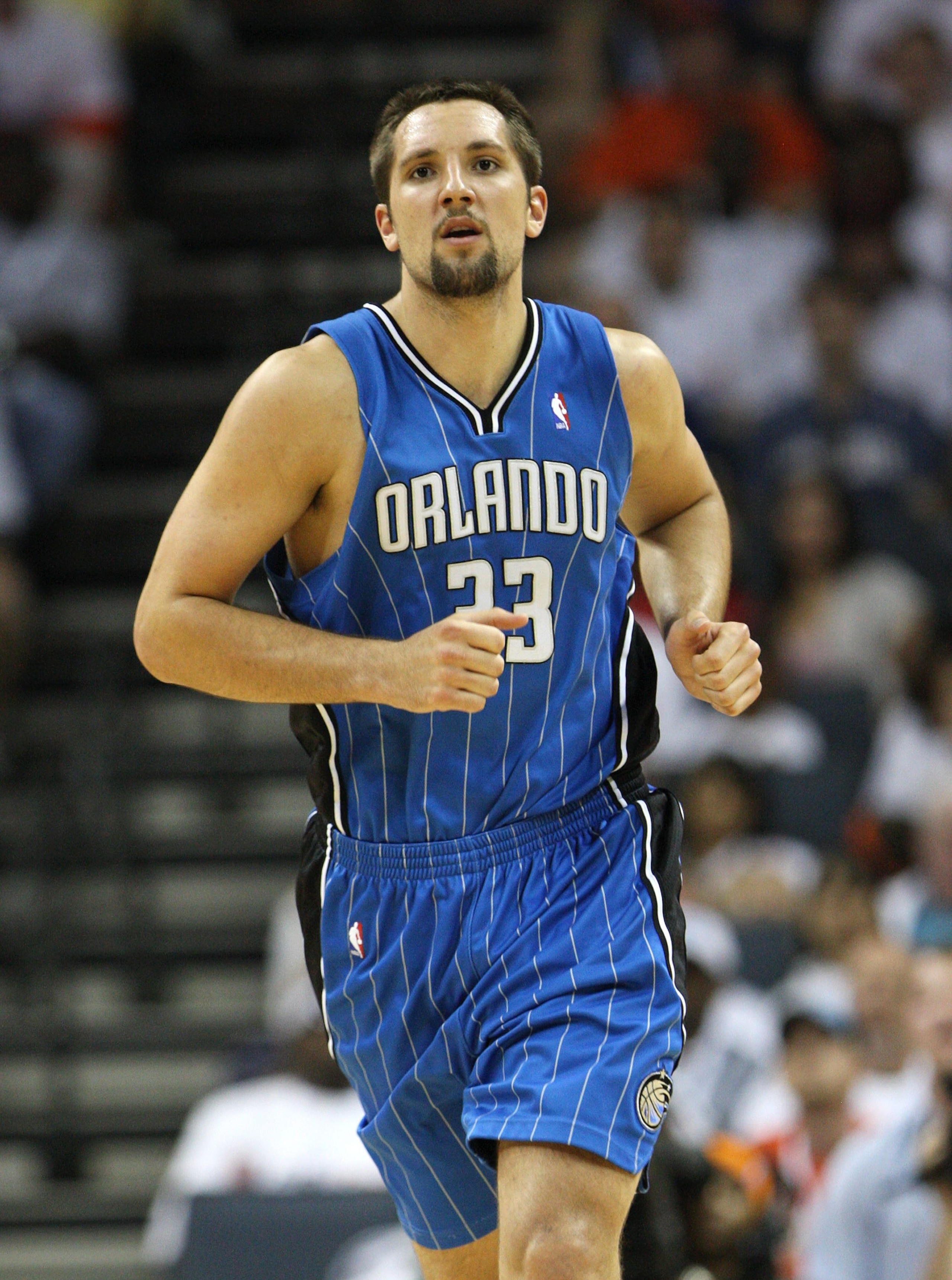 CHARLOTTE - APRIL 24:  Forward Ryan Anderson #33 of the Orlando Magic runs upcourt during Game Three of the Eastern Conference Quarterfinals against the Charlotte Bobcats during the 2010 NBA Playoffs at Time Warner Cable Arena on April 24, 2010 in Charlot