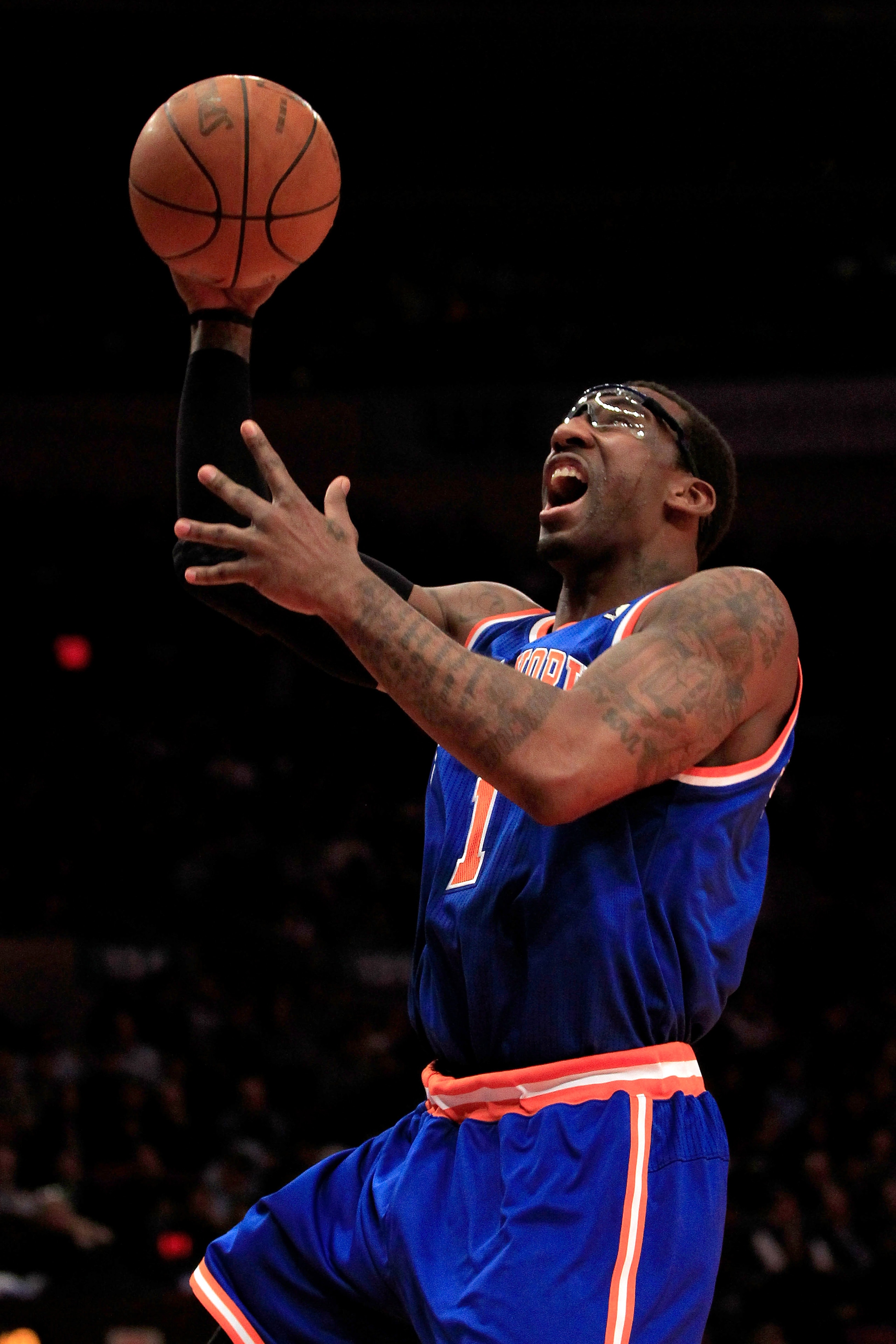 NEW YORK, NY - FEBRUARY 16:  Amar'e Stoudemire #1 of the New York Knicks lays the ball up against the Atlanta Hawks at Madison Square Garden on February 16, 2011 in New York City. NOTE TO USER: User expressly acknowledges and agrees that, by downloading a