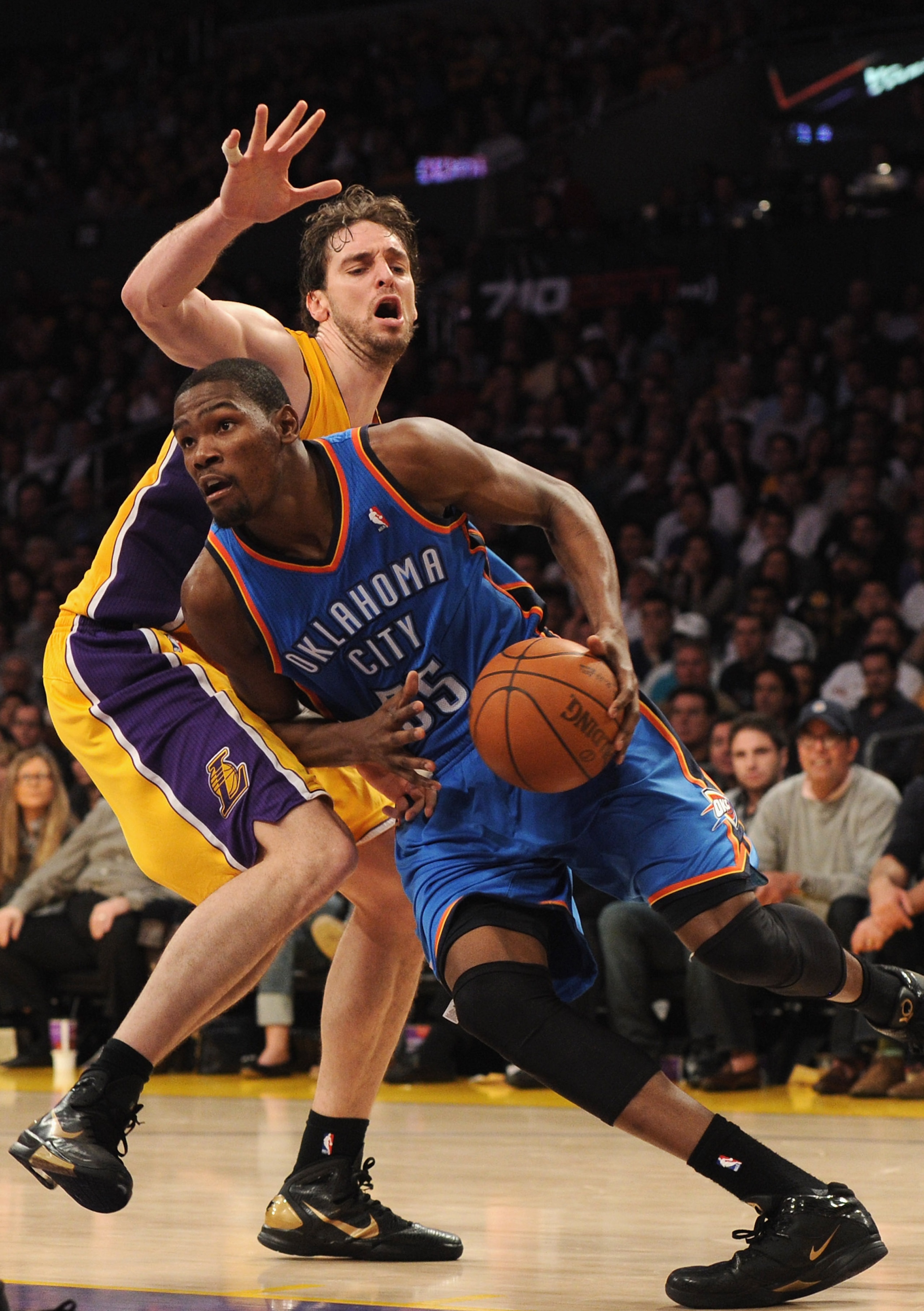 LOS ANGELES, CA - JANUARY 17:  Kevin Durant #35 of the Oklahoma City Thunder dribbles around Pau Gasol #16 of the Los Angeles Lakers during a 101-94 Laker win at the Staples Center on January 17, 2011 in Los Angeles, California.   NOTE TO USER: User expre