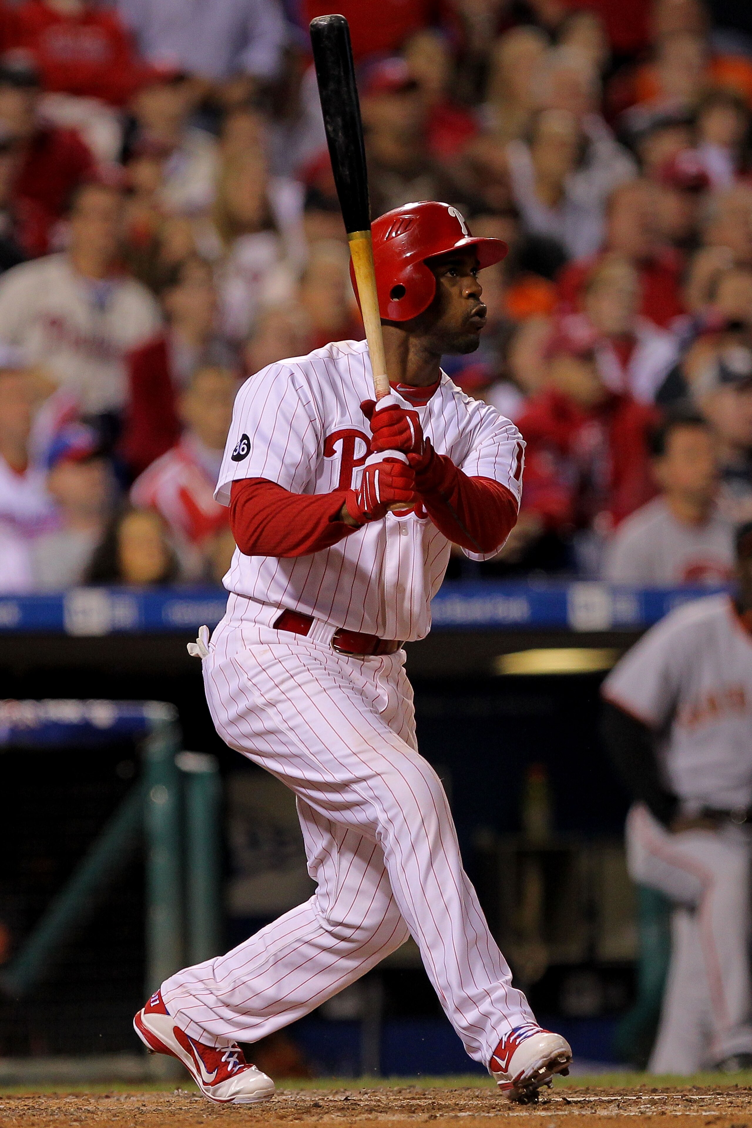 PHILADELPHIA - OCTOBER 17:  Jimmy Rollins #11 of the Philadelphia Phillies hits a three run double to left field in the seventh inning against the San Francisco Giants in Game Two of the NLCS during the 2010 MLB Playoffs at Citizens Bank Park on October 1