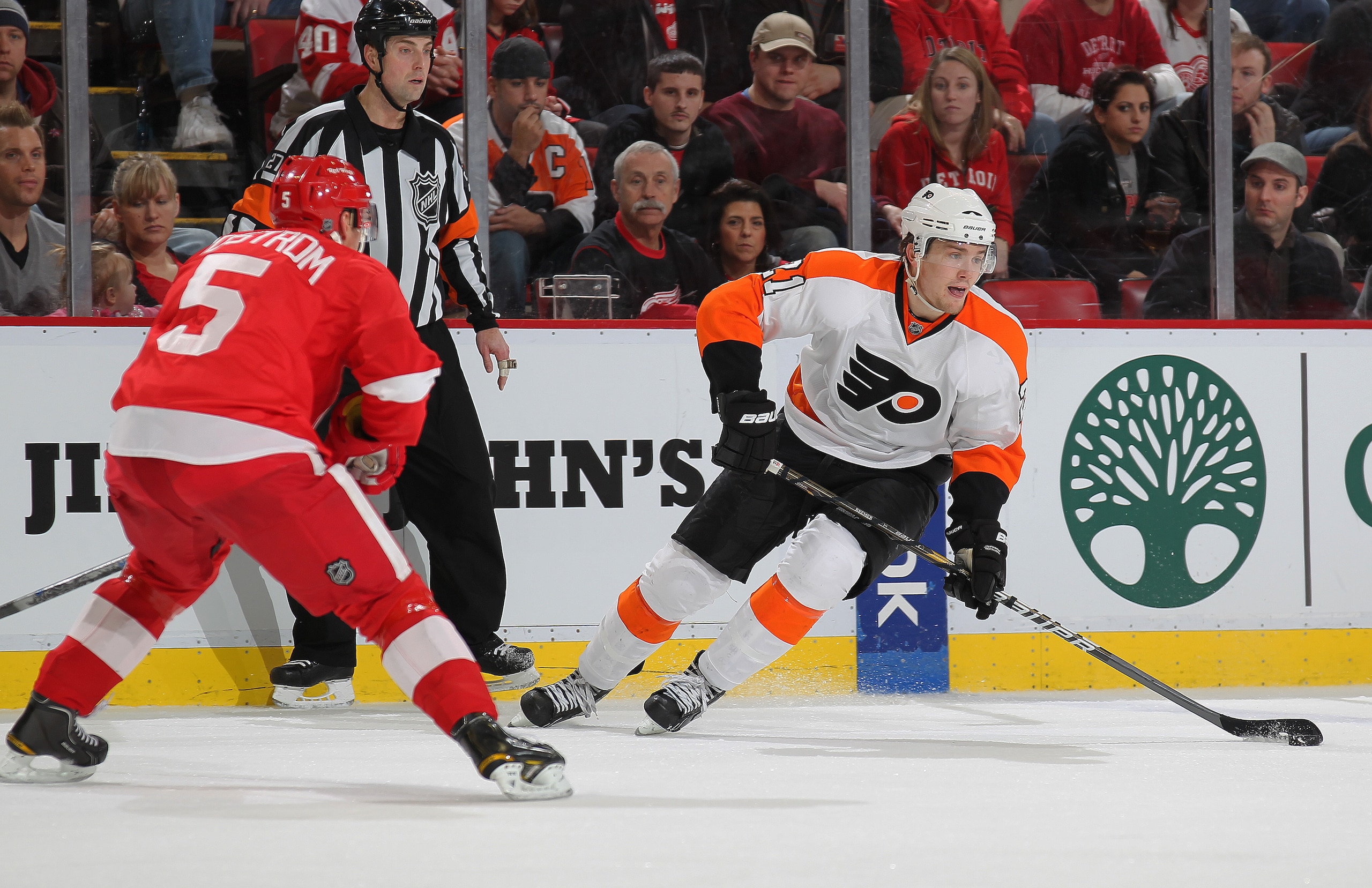 DETROIT, MI - JANUARY 2: James Van Riemsdyk #21 of the Philadelphia Flyers tries to skate around Nicklas Lidstrom #5 of the Detroit Red Wings in a game on January 2, 2011 at the Joe Louis Arena in Detroit, Michigan. The Flyers defeated the Wings 3-2. (Ph DETROIT, MI - JANUARY 2: James Van Riemsdyk #21 of the Philadelphia Flyers tries to skate around Nicklas Lidstrom #5 of the Detroit Red Wings in a game on January 2, 2011 at the Joe Louis Arena in Detroit, Michigan. The Flyers defeated the Wings 3-2. (Ph